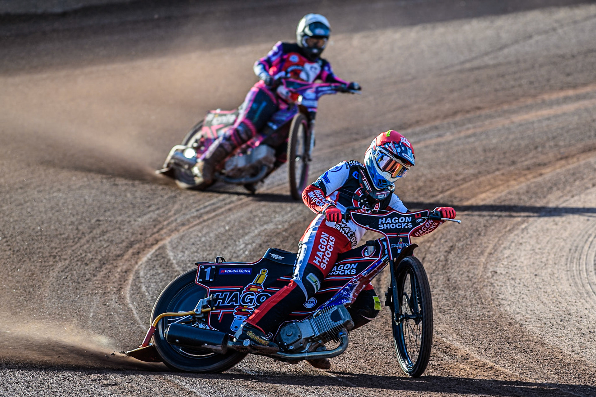 Belle Vue Colts' Sam Hagon in Red leading Middlesbrough Tigers' Ben Trigger in White during the WSRA National Development League match between Belle Vue Colts and Middlesbrough Tigers at the National Speedway Stadium, Manchester on Monday 17th June 2024. (Photo: Ian Charles | MI News)