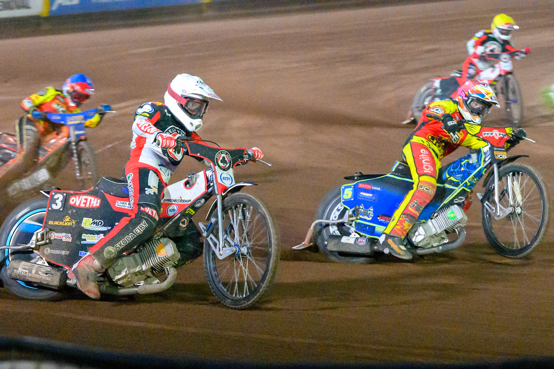 Peter Kildemand of Belle Vue Aces  in White rides outside Sam Masters of Leicester Lions in Red with Jordan Jenkins, Guest Rider for Leicester Lions  in Blue and Zach Cook of Belle Vue Aces  in Yellow behind during the Rowe Motor Oil Premiership match between Leicester Lions and Belle Vue Aces at the Hydroscan Arena, Leicester on Monday 7th September 2026. (Photo: Ian Charles | MI News)