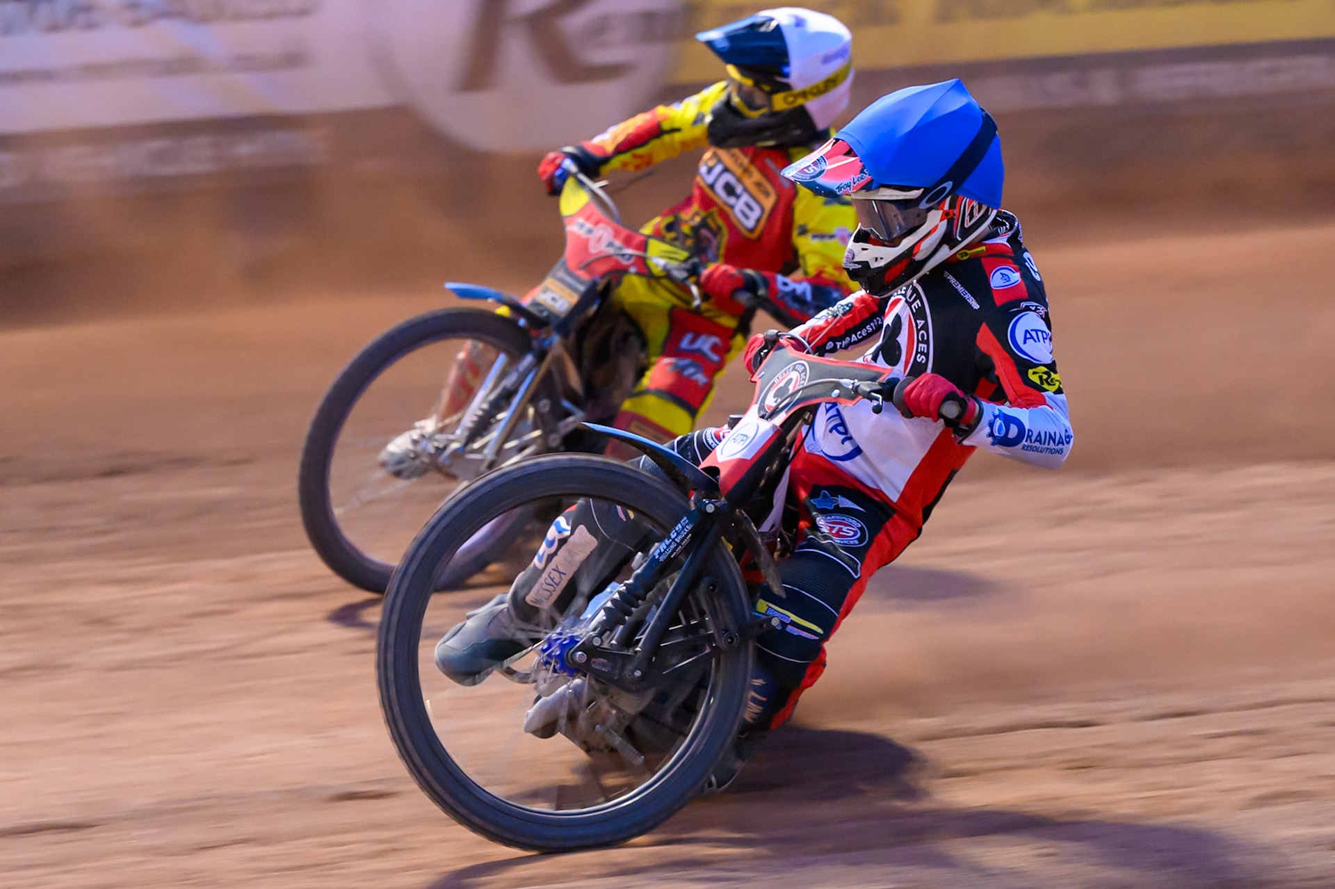 Zach Cook of Belle Vue Aces in Blue rides inside Ryan Douglas of Leicester Lions in White during the Rowe Motor Oil Premiership match between Belle Vue Aces and Leicester Lions at the National Speedway Stadium, Manchester on Monday 3rd August 2026. (Photo: Ian Charles | MI News)