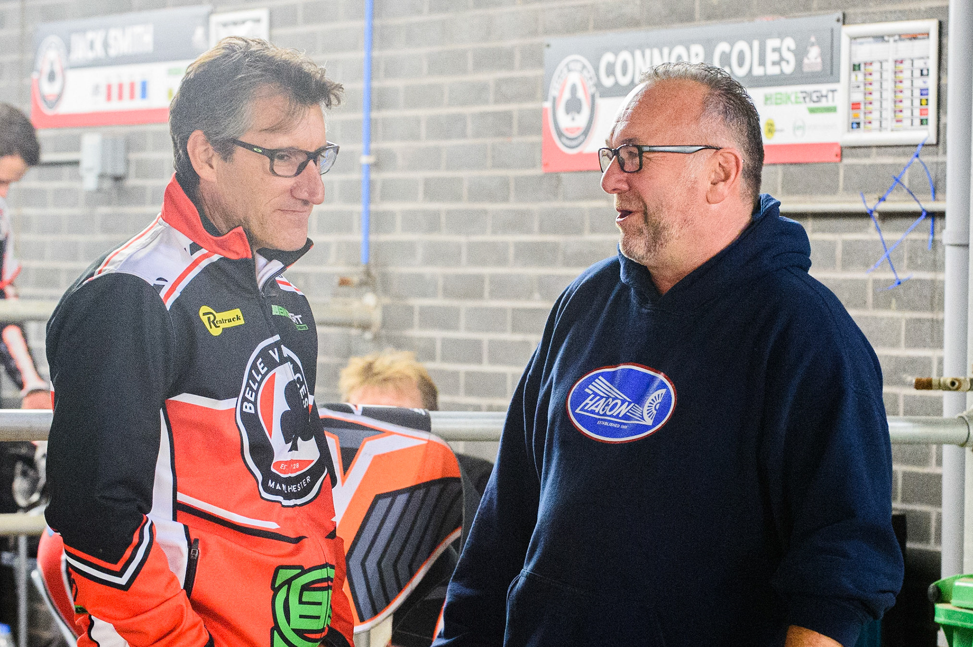 MANCHESTER, SEPT 3RD. Belle Vue Director of Speedway mark Lemon (left) chats with former Kings Lynn Manager Peter Schroek during the National Development League match between Belle Vue Aces and Mildenhall Fens Tigers at the National Speedway Stadium, Manchester on Friday 3rd September 2021. (Credit: Ian Charles | MI News)