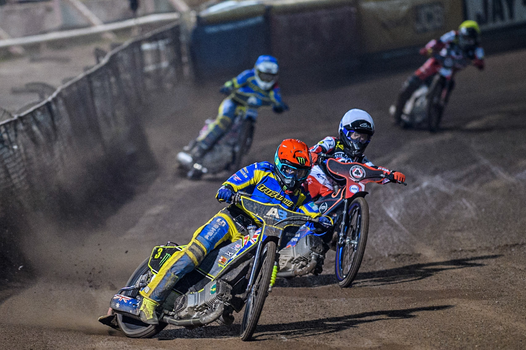 Sheffield Tigers' Chris Holder  in Red leading Belle Vue Aces' Brady Kurtz  in White and Sheffield Tigers' Josh Pickering  in Blue during the Rowe Motor Oil Premiership Play Off Semi Final 2nd leg between Sheffield Tigers and Belle Vue Aces at Owlerton Stadium, Sheffield on Thursday 19th September 2024. (Photo: Ian Charles | MI News)