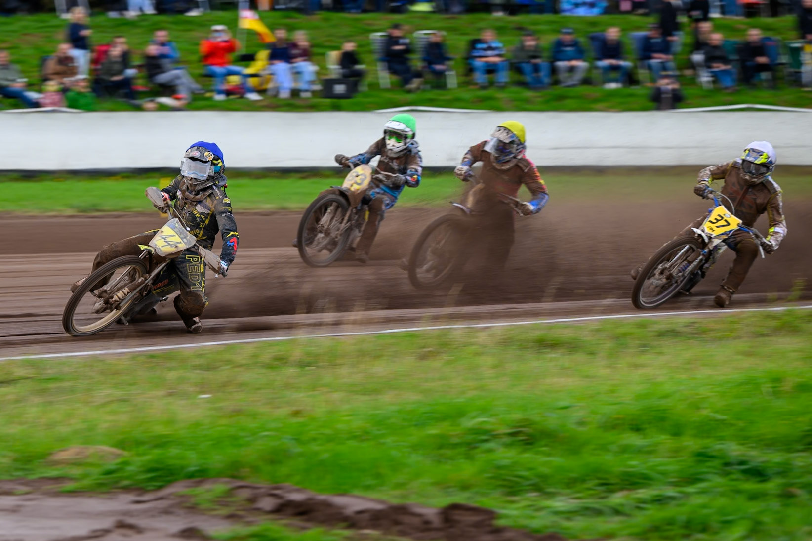Tero Aarnio (44) of Finland in Blue leading Stephan Katt (42) of Germany in Yellow, Chris Harris (37) of Great Britain in White and Dave Meijerink (63) of The Netherlands in Green during the FIM Long Track World Championship Final 4, at the Speed Centre Roden, Netherlands on Sunday 21st September 2025. (Photo: Ian Charles | MI News)during the FIM Long Track World Championship Final 4, at the Speed Centre, Roden on Sunday 21st September 2025. (Photo: Ian Charles | MI News)
