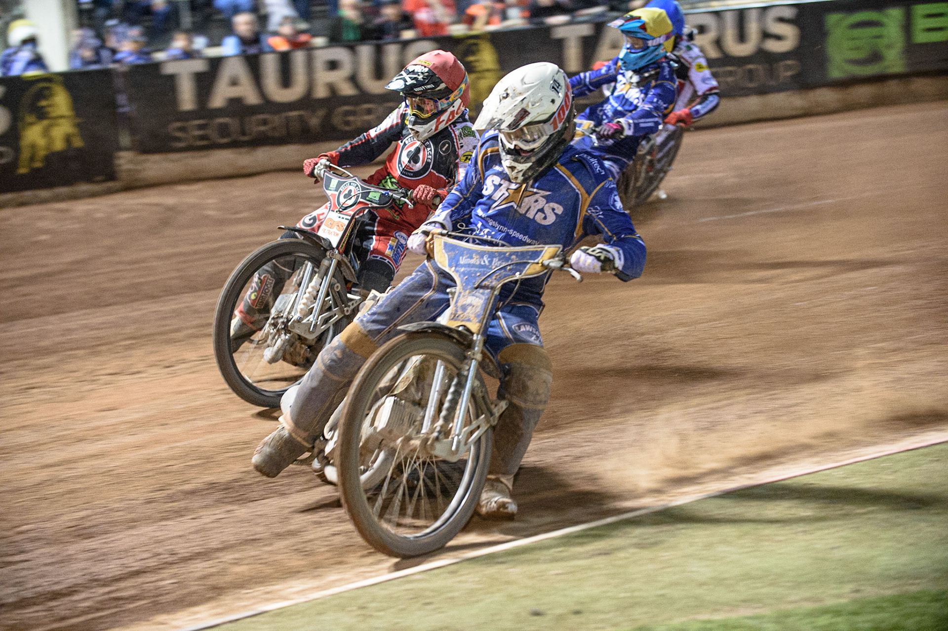 MANCHESTER, UK. AUGUST 23RD    Richard Lawson  (White) leads Dan Bewley  (Red) with Thomas Jorgensen  (Yellow) and Brady Kurtz  (Blue) behind during the SGB Premiership match between Belle Vue Aces and King's Lynn Stars at the National Speedway Stadium, Manchester on Monday 23rd August 2021. (Credit: Ian Charles | MI News)