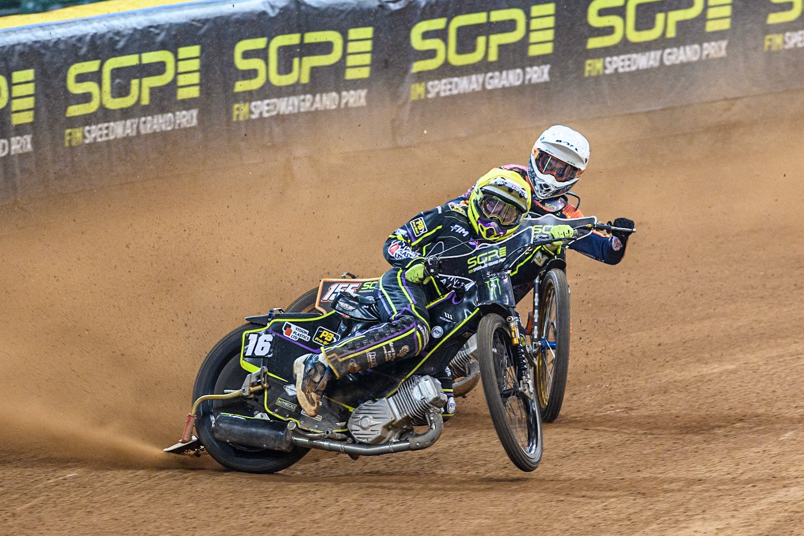 Tom Brennan (16) Wild card rider of Great Britain in Yellow leading Mikkel Michelsen (155) of Denmark in White during the FIM Speedway Grand Prix of Great Britain at The Principality Stadium, Cardiff on Saturday 17th August 2024. (Photo: Ian Charles | MI News)