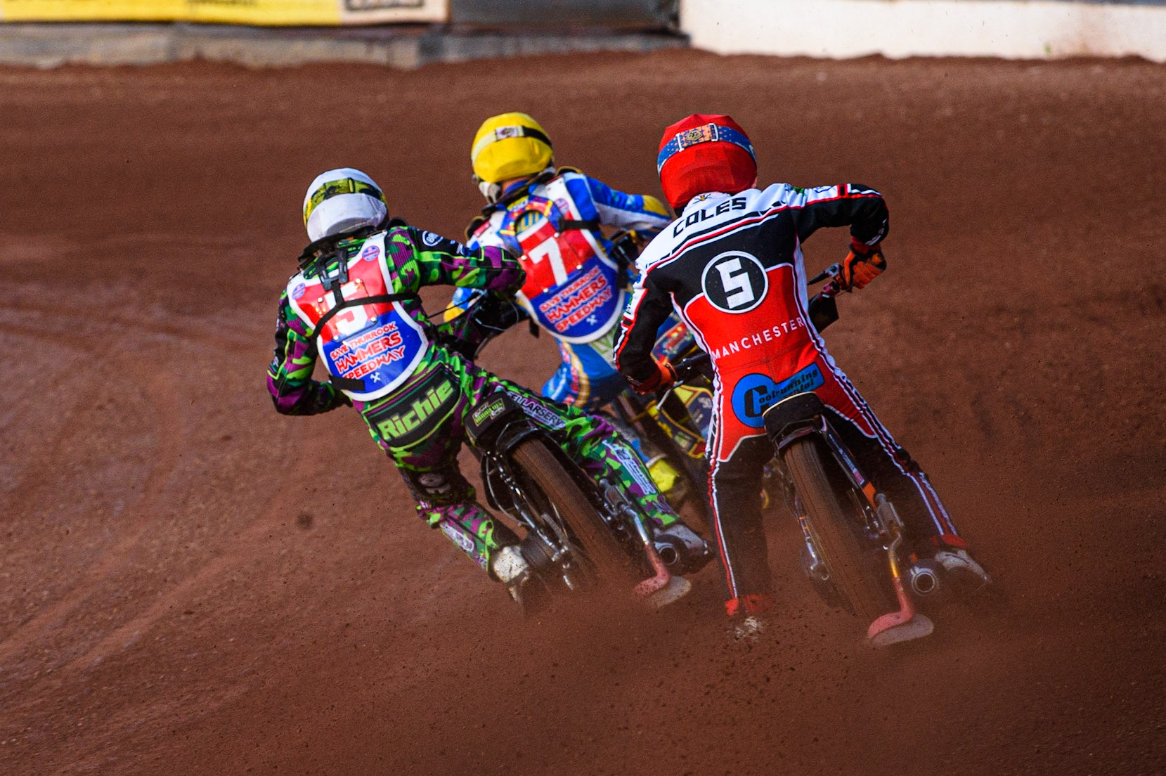 MANCHESTER, UK. JULY 23RD Connor Coles  \r\ chases Richard Andrews  (White) and Nathan Ablitt  (Yellow) during the National Development League match between Belle Vue Colts and Eastbourne Seagulls at the National Speedway Stadium, Manchester on Friday 23rd July 2021. (Credit: Ian Charles | MI News)