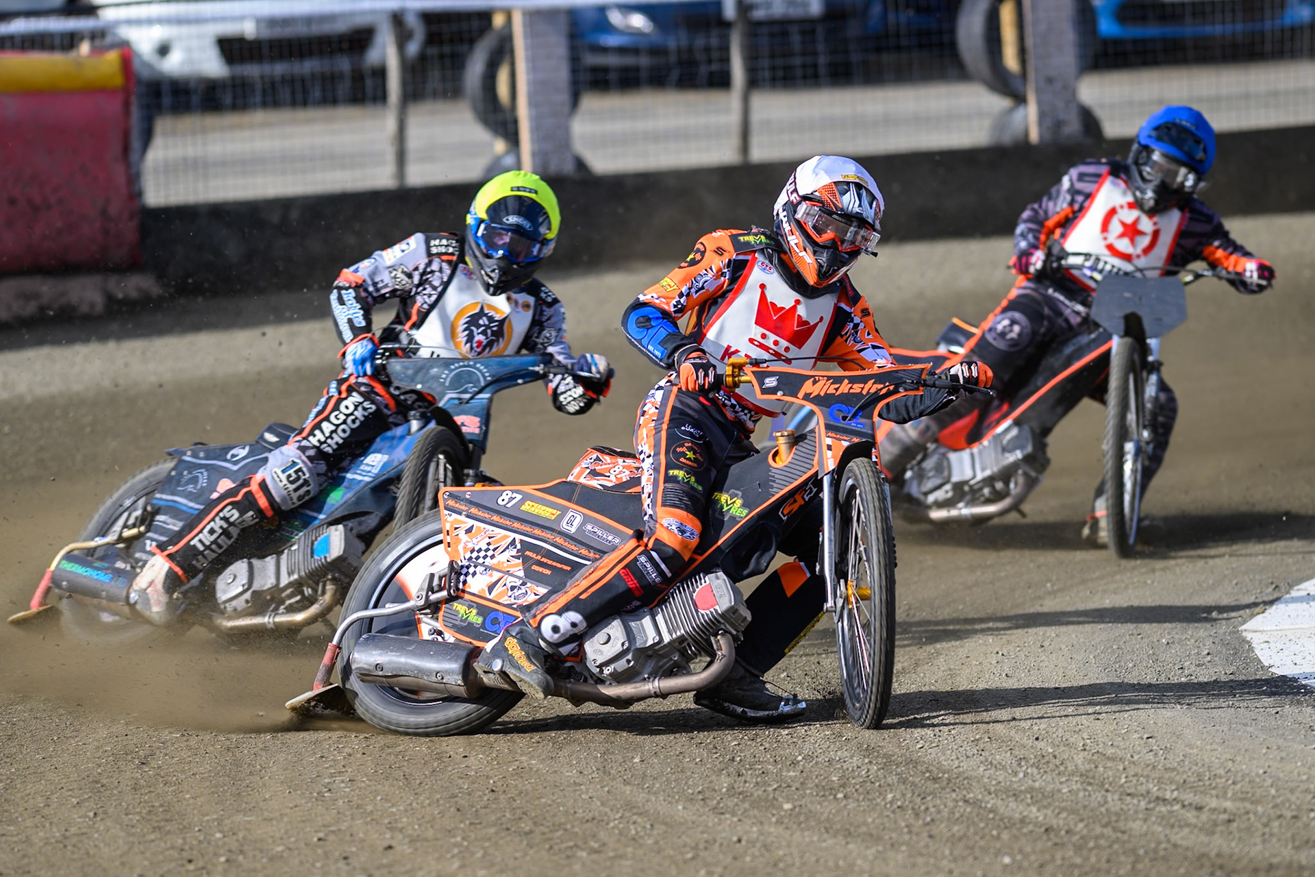 Mickie Simpson of 'The Kings'  in White leading Jack Kingston of 'The Wolves'  in Yellow and Jack Roberts of 'The Potters'  in Blue during the Regina Chains Fours at Buxton Speedway, Buxton on Sunday 5th April 2026. (Photo: Ian Charles | MI News)