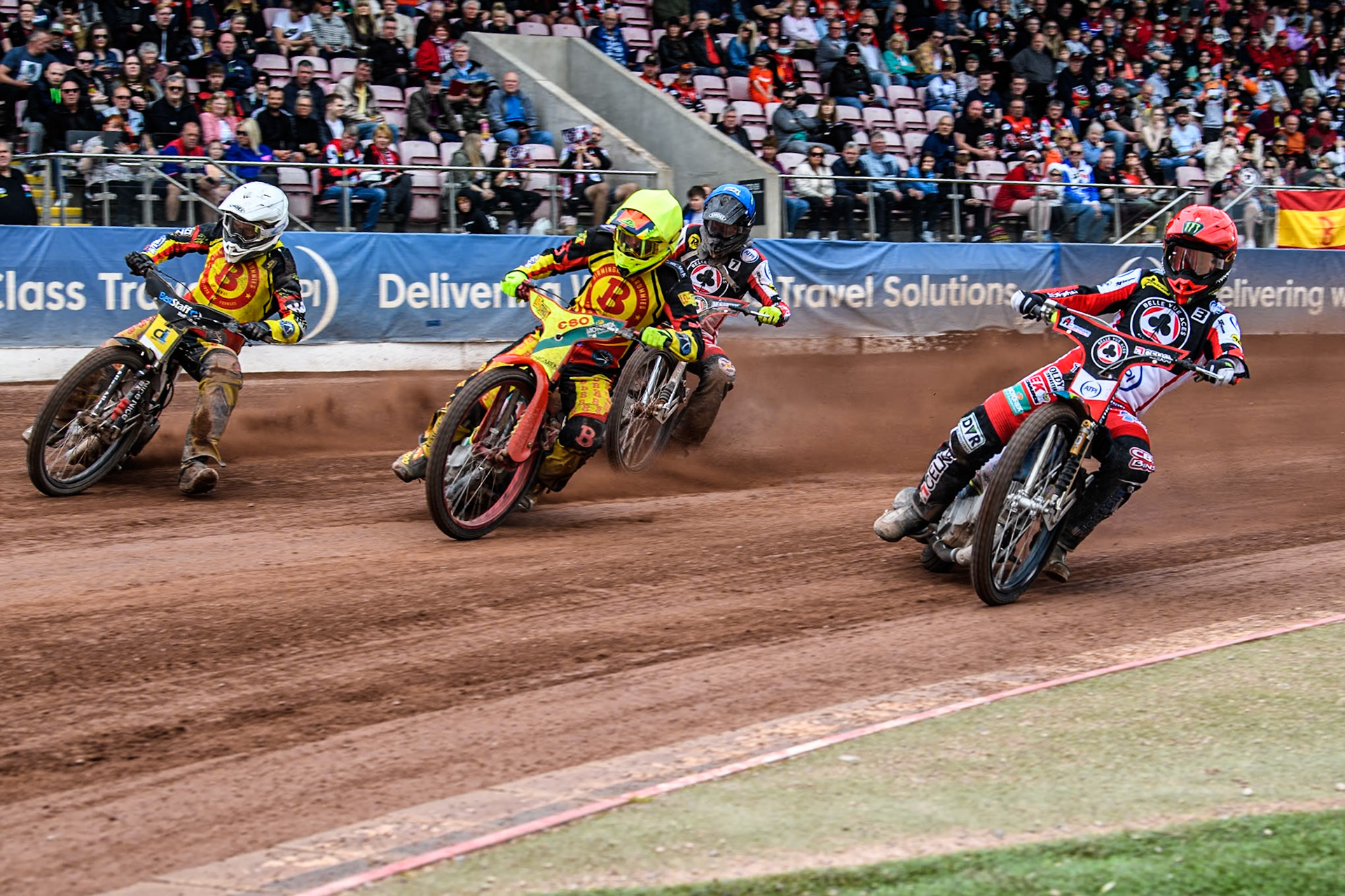 Belle Vue Aces' Jaimon Lidsey  in Red rides inside Birmingham Brummies' Vaclav Milik  in Yellow and Birmingham Brummies' Wiktor Lampart  in White with Belle Vue Aces' Connor Bailey  behind during the Rowe Motor Oil Premiership match between Belle Vue Aces and Birmingham Brummies at the National Speedway Stadium, Manchester on Monday 6th May 2024. (Photo: Ian Charles | MI News)