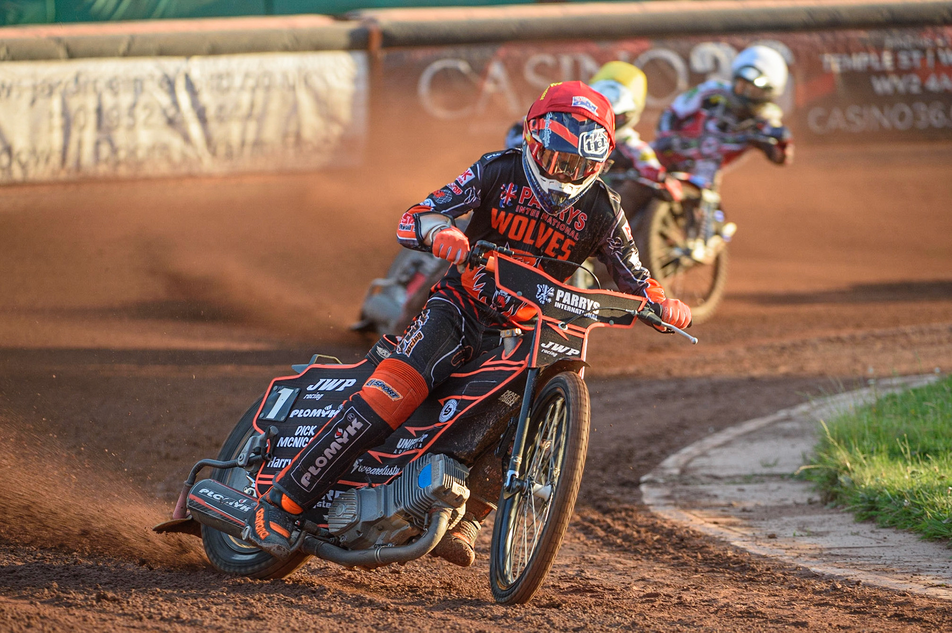 WOLVERHAMPTON, UK. JULY 26TH Sam Masters  (Red) well ahead of Belle Vue BikeRight Aces  riders Richie Worrall  (Yellow) and Brady Kurtz (White) during the SGB Premiership match between Wolverhampton Wolves and Belle Vue Aces at the Ladbroke Stadium, Wolverhampton on Monday 26th July 2021. (Credit: Ian Charles | MI News)