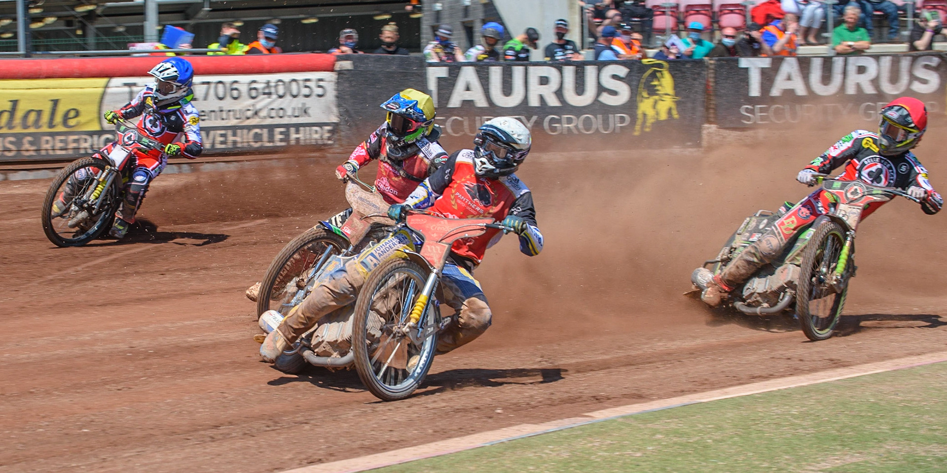 MANCHESTER, UK. MAY 31ST  Bjarne Pedersen (White) and Hans Andersen (Yellow) lead Charles Wright  (Red) and Tom Brennan  (Blue) during the SGB Premiership match between Belle Vue Aces and Peterborough at the National Speedway Stadium, Manchester on Monday 31st May 2021. (Credit: Ian Charles | MI News)