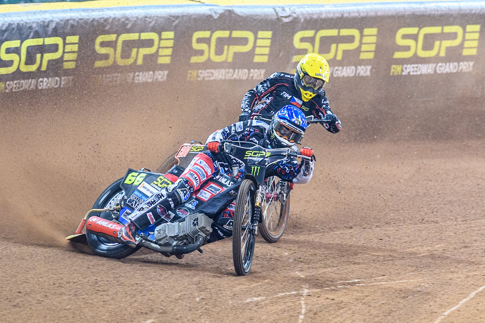Fredrik Lindgren (66) of Sweden in Blue leading January Kvech (201) of Czechia in Yellow during the FIM Speedway Grand Prix of Great Britain at The Principality Stadium, Cardiff on Saturday 17th August 2024. (Photo: Ian Charles | MI News)