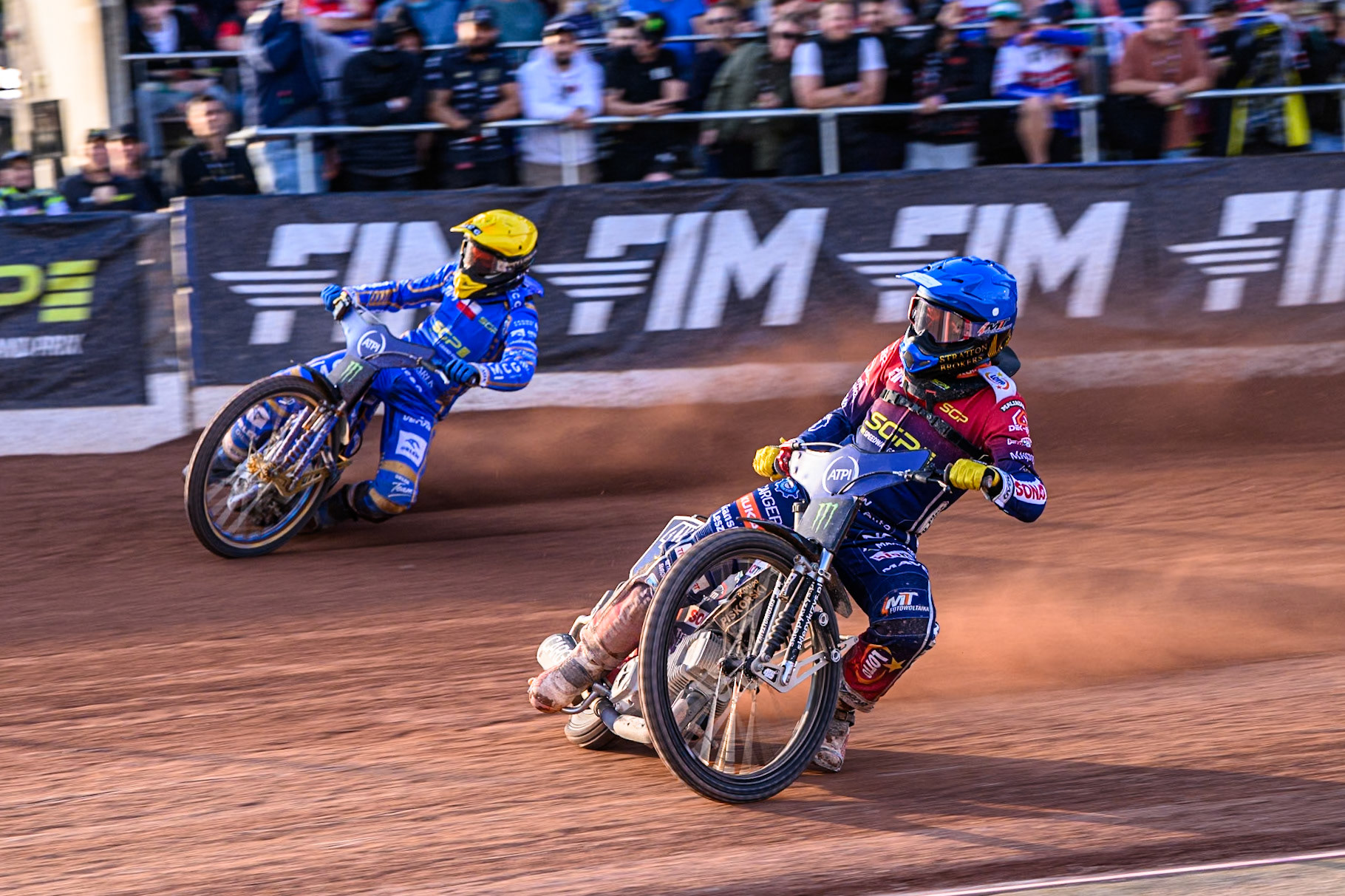 Dominik Kubera (415) of Poland in Blue rides inside Bartosz Zmarzlik (95) of Poland in Yellow during the ATPI FIM Speedway Grand Prix Round 5 at the National Speedway Stadium, Manchester, on Saturday 14th June 2025. (Photo: Ian Charles | MI News)