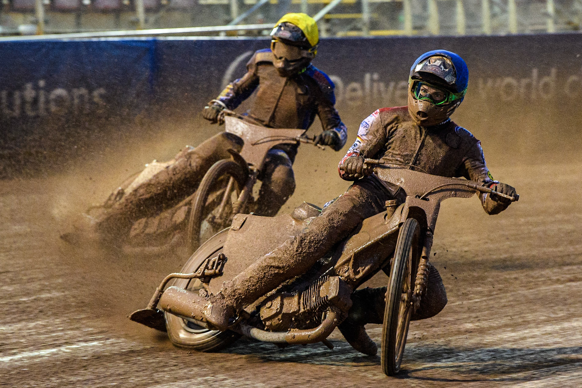 Charles Wright (Blue) leads  Simon Lambert (Yellow) during the Sports Insure Premiership match between Belle Vue Aces and King's Lynn Stars at the National Speedway Stadium, Manchester on Monday 21st August 2023. (Photo: Ian Charles | MI News)