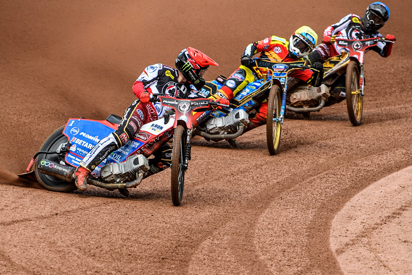 Dan Bewley  (Red) leads Justin Sedgmen  (Yellow) and Norick Blodorn  (Blue) during the SGB Premiership match between Belle Vue Aces and Leicester Lions at the National Speedway Stadium, Manchester on Monday 1st May 2023. (Photo: Ian Charles | MI News)