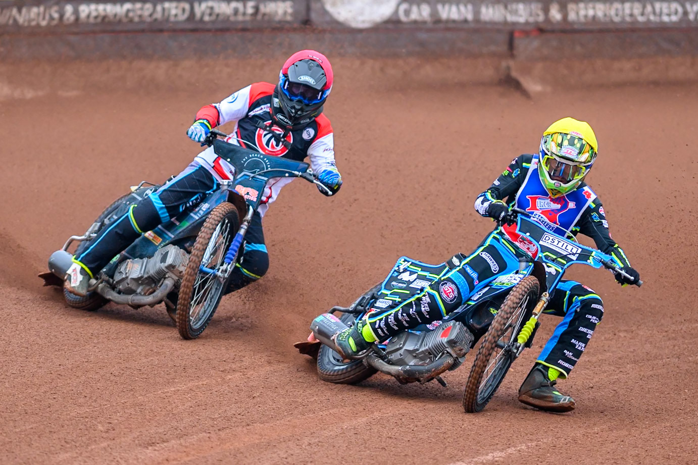 Steelers' Guest Rider Senna Summers  in Yellow rides inside Belle Vue Colts' Jack Kingston in Red during the WSRA National Development League match between Belle Vue Colts and Sheffield/Scunthorpe Steelers at the National Speedway Stadium, Manchester on Sunday 12th October 2025. (Photo: Ian Charles | MI News)
