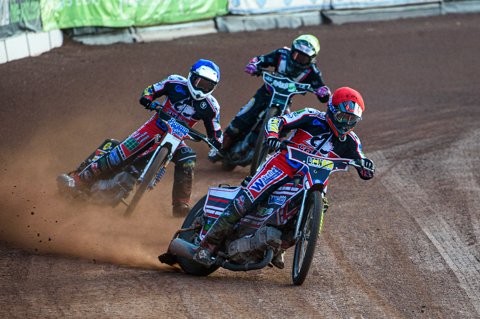 MANCHESTER, UK. JULY 23RD  Jack Parkinson-Blackburn  (Red) and Paul Bowen  (Blue) lead Connor King  (Yellow)during the National Development League match between Belle Vue Colts and Eastbourne Seagulls at the National Speedway Stadium, Manchester on Friday 23rd July 2021. (Credit: Ian Charles | MI News)