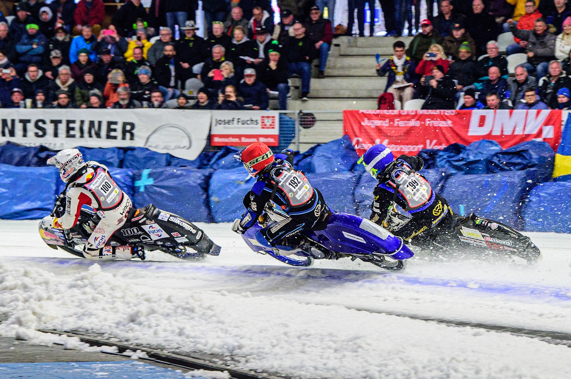 Franz Zorn (100) (White) leads Niclas Svensson (192) (Red) and Martin Haarahiltunen (199) (White) to the first turn during the Ice Speedway Gladiators World Championship Final 2 at Max-Aicher-Arena, Inzell, Germany on Sunday 19th March 2023. (Photo: Ian Charles | MI News)