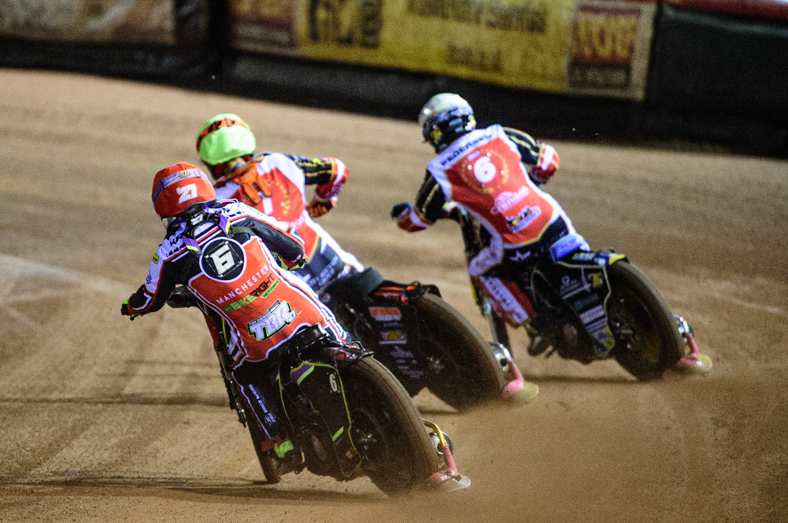 MANCHESTER, UK. OCT 11TH  Tom Brennan  (Red) chases Jordan Palin  (Yellow) and Bjarne Pedersen  (White) during the SGB Premiership Grand Final 1st Leg between Belle Vue Aces and Peterborough Panthers at the National Speedway Stadium, Manchester on Monday 11th October 2021. (Credit: Ian Charles | MI News)