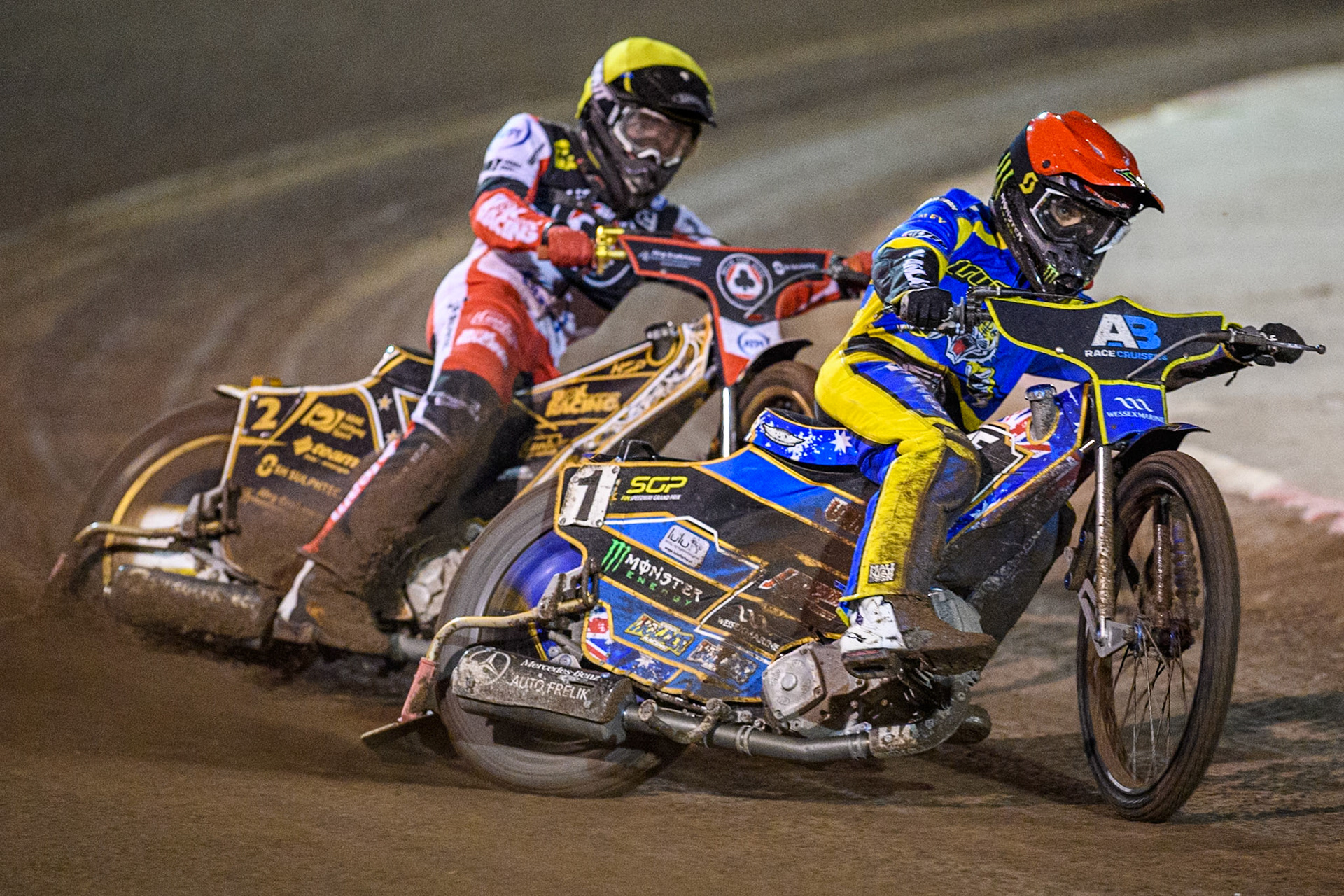Sheffield Tigers' Jack Holder  in Red leading Belle Vue Aces' Norick Blodorn  in Yellow during the Rowe Motor Oil Premiership Play Off Semi Final 2nd leg between Sheffield Tigers and Belle Vue Aces at Owlerton Stadium, Sheffield on Thursday 19th September 2024. (Photo: Ian Charles | MI News)