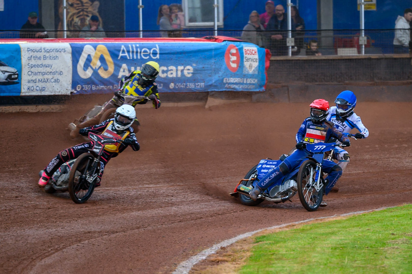 Kai Huckenbeck of Germany in White leading Piotr Pawlicki of Poland in Red, Casper Henriksson of Sweden in Yellow and Antti Vuolas of Finland in Blue during the Speedway GP Qualifying Round 3 at Allied Ashfield Stadium, Glasgow on Saturday 30th May 2026. (Photo: Ian Charles | MI News)