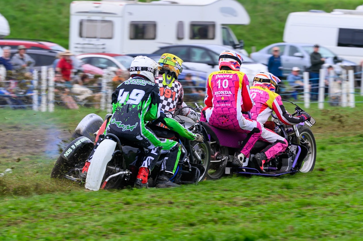 British Masters 1000cc Sidecars: Gareth Winterburn/Frankie Courtney (49) chases Clint Blondell/Lewis Davies (10) during the British Masters Grasstrack Championship at Lower Marsh Farm, Much Hoole, Preston in Lancashire, England on Sunday 13th September 2026. (Photo: Ian Charles | MI News)
