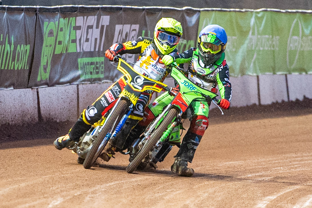Photo: Ian CharlesLuke Harrison (Blue) and Max James (Yellow) tangle on the back straight (250cc Class)British Youth Speedway Championship (Round 5), National Speedway Stadium, Manchester Saturday  10  October  2020