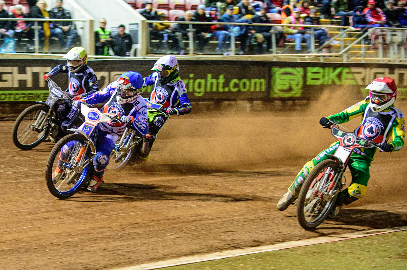 MANCHESTER, UK. OCT 23RD  Max Fricke  (Red) inside Jason Crump  (Blue) with Nick Morris  (White) and Broc Nicol  (Yellow) behind during the Peter Craven Memorial Trophy event at the National Speedway Stadium, Manchester on Saturday 23rd October 2021. (Credit: Ian Charles | MI News)