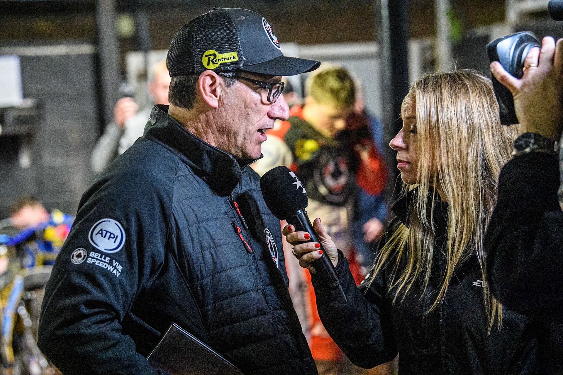Belle Vue Aces' Team Manager Mark Lemon is interviewed by Eurosport presenter Abi Stephens following Belle Vue Aces' Ben Cook crashed , and was taken to hospital during the Rowe Motor Oil Premiership Play Off Semi Final 2nd leg between Sheffield Tigers and Belle Vue Aces at Owlerton Stadium, Sheffield on Thursday 19th September 2024. (Photo: Ian Charles | MI News)