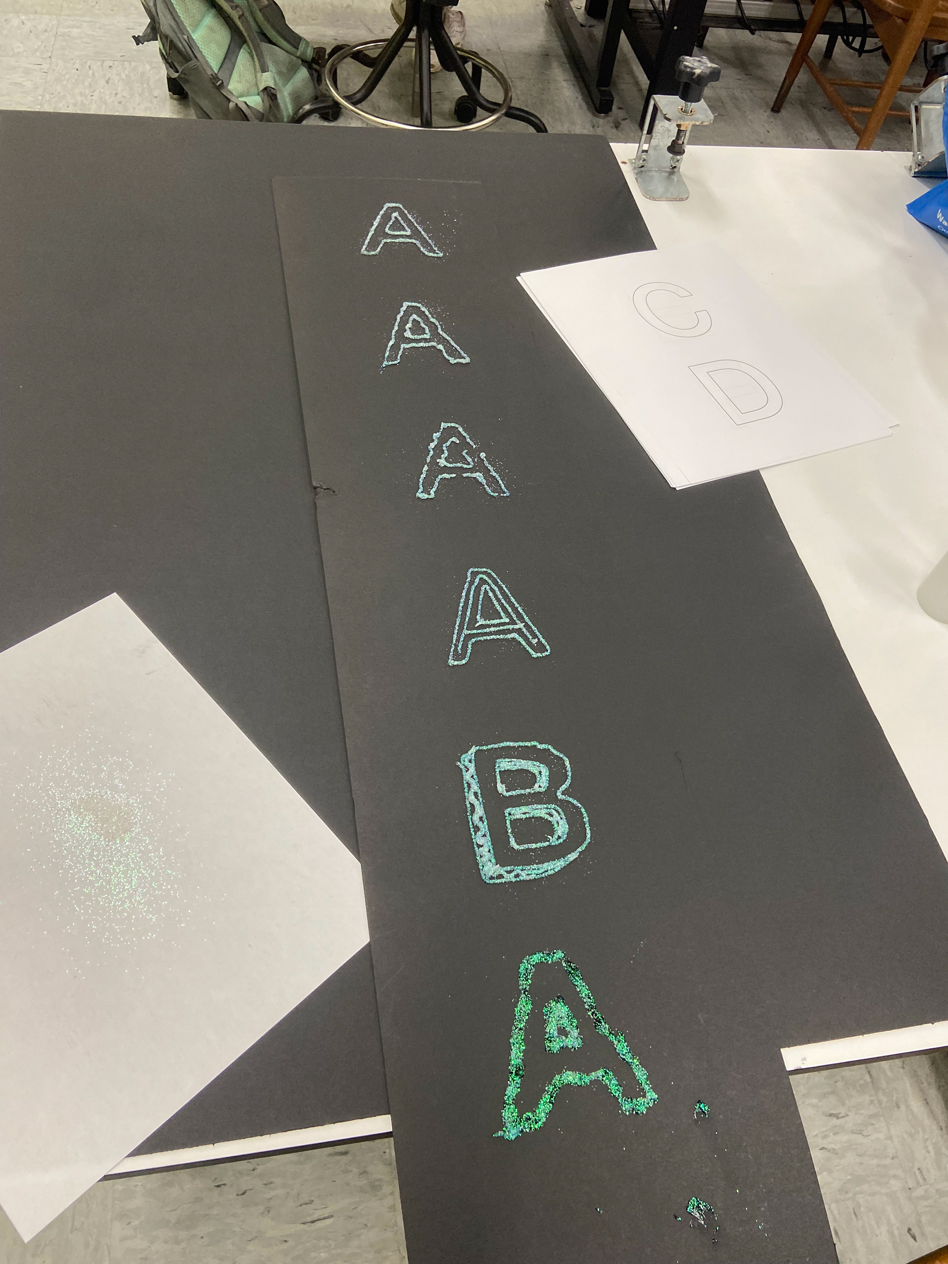 Experiment with glitter alphabet