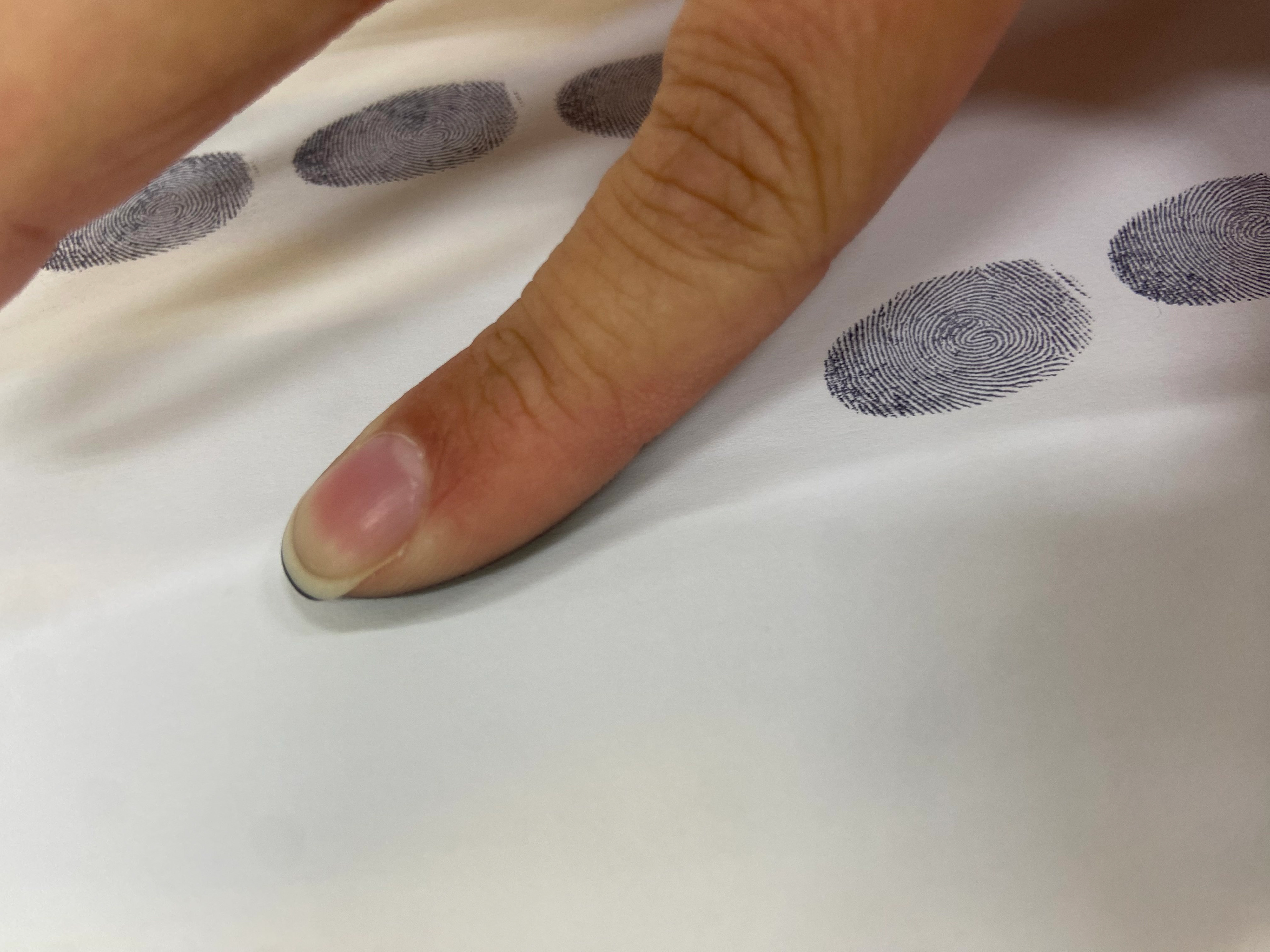 Physical application of fingerprints on paper