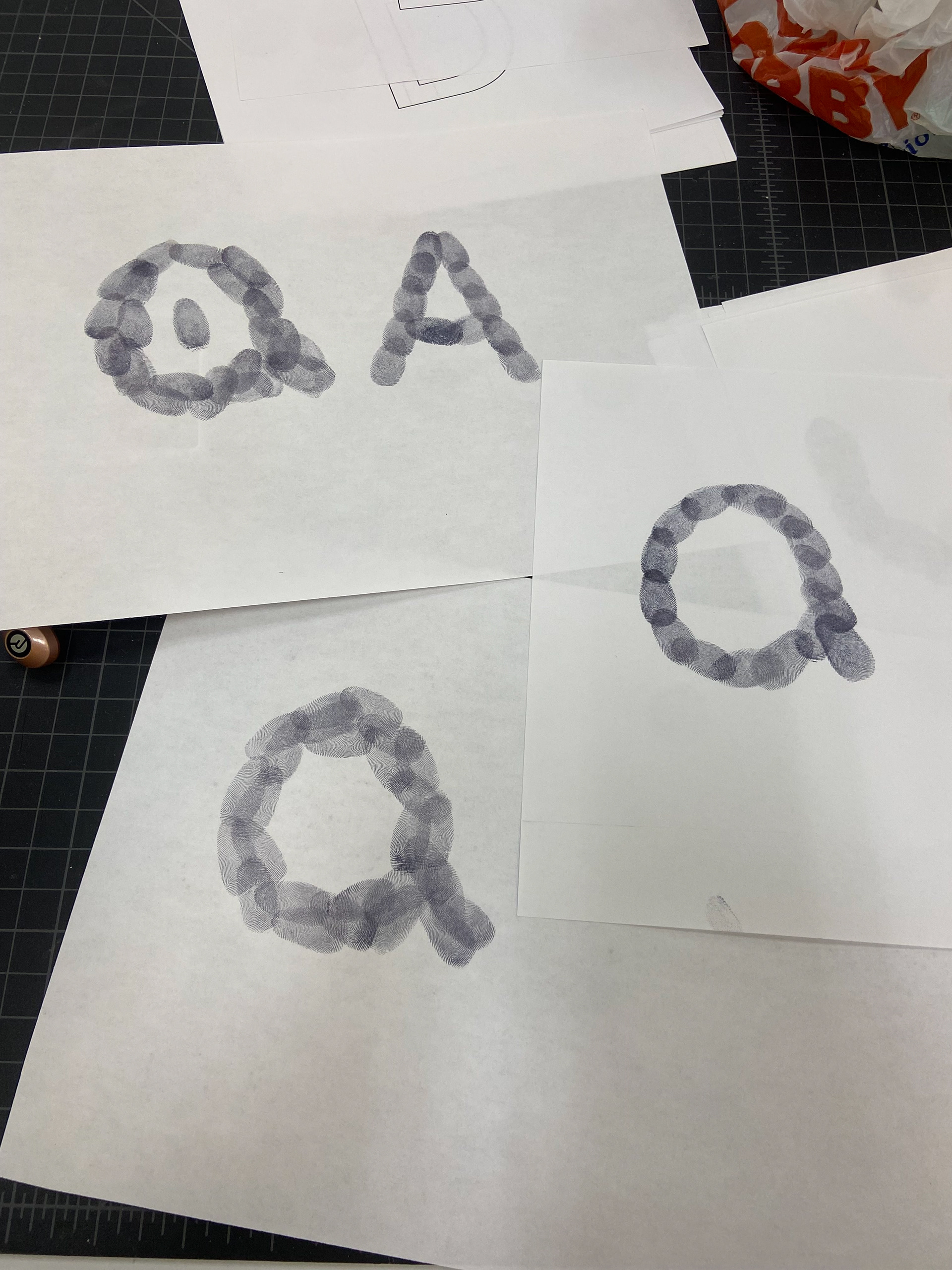 Experimental layouts for fingerprint alphabet