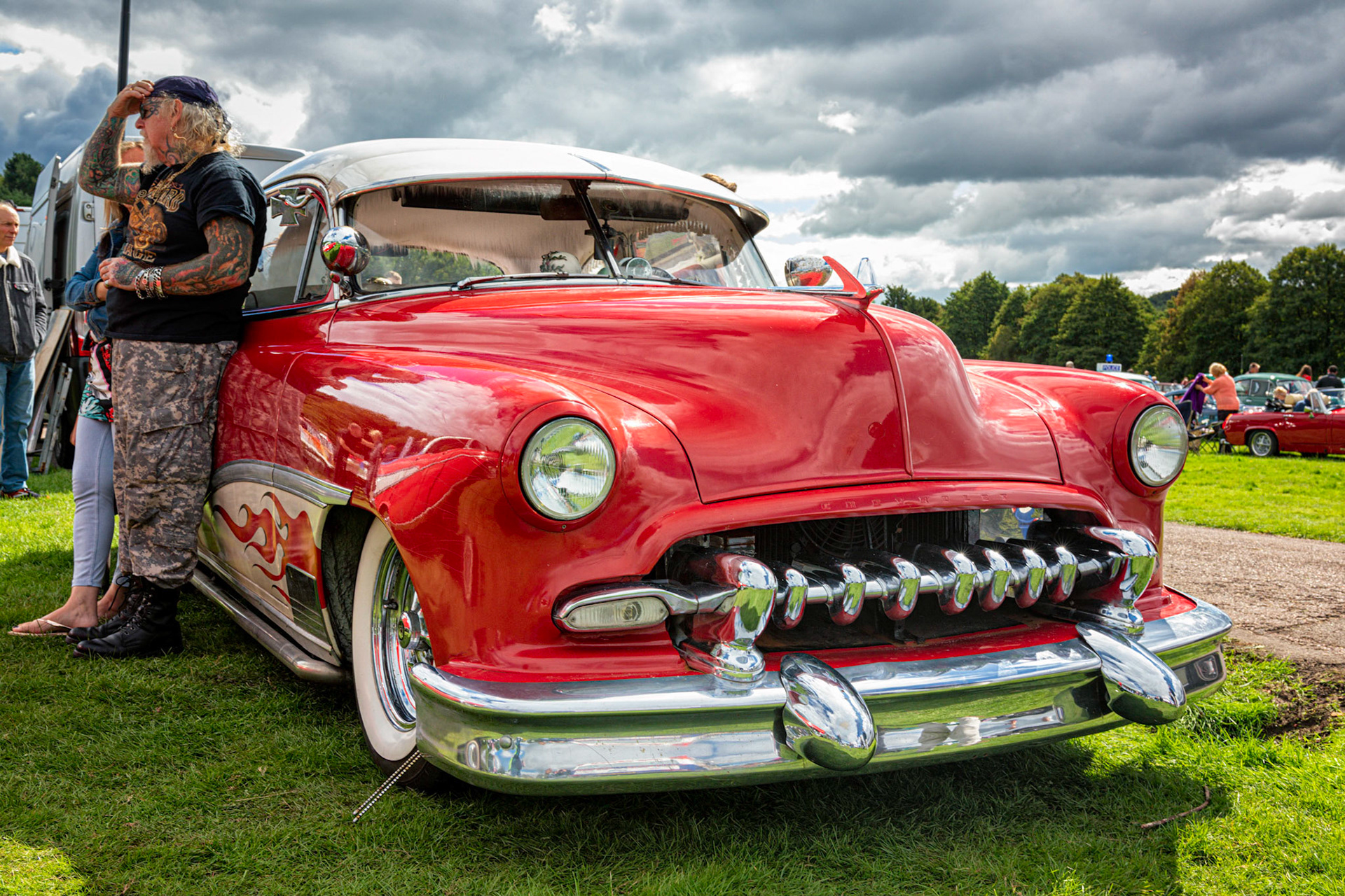 The owner actually had tattoos which seemed to match the painting on his car