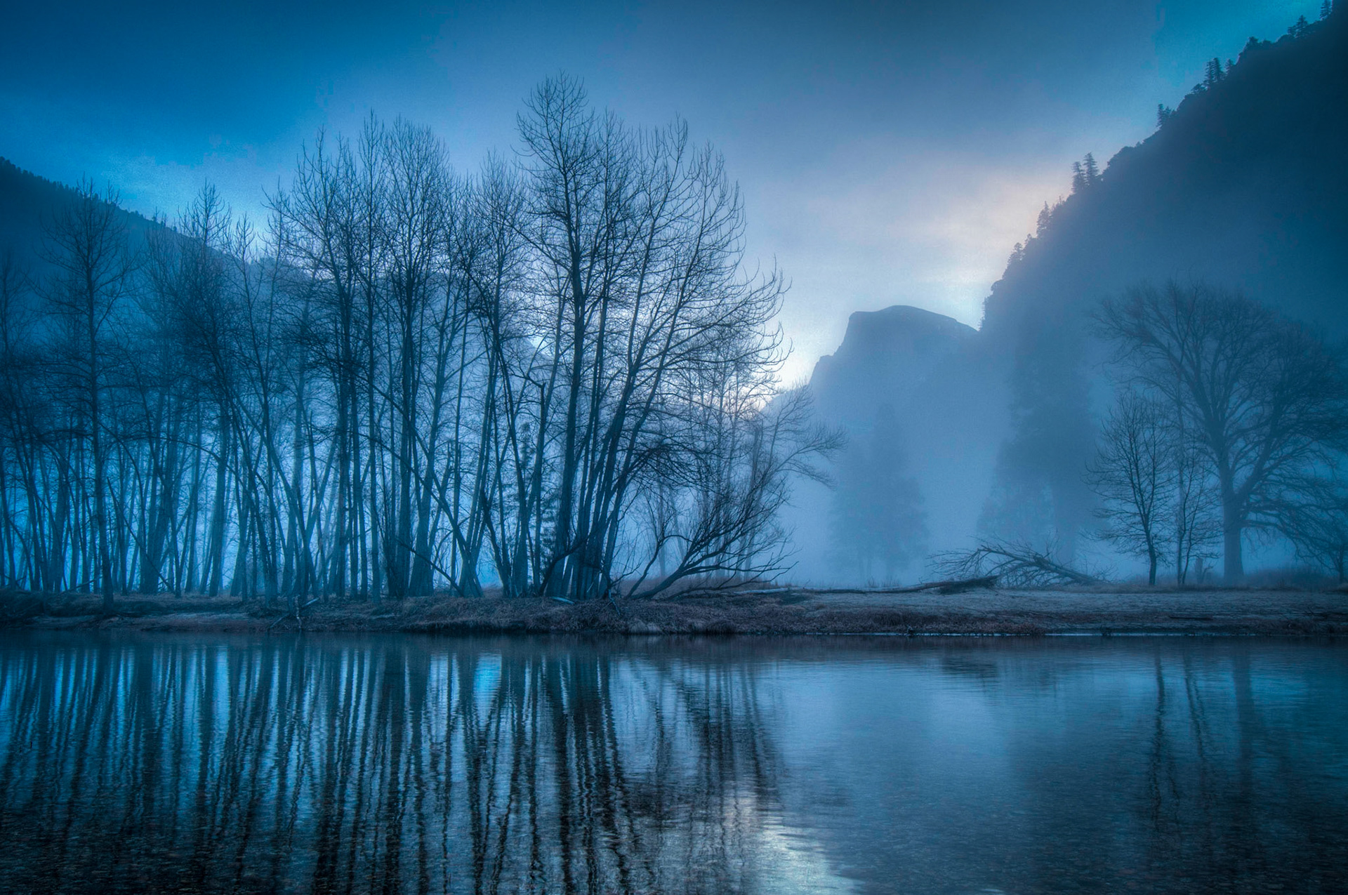 A misty winter morning along the Merced River in Yosemite National Park, CA.