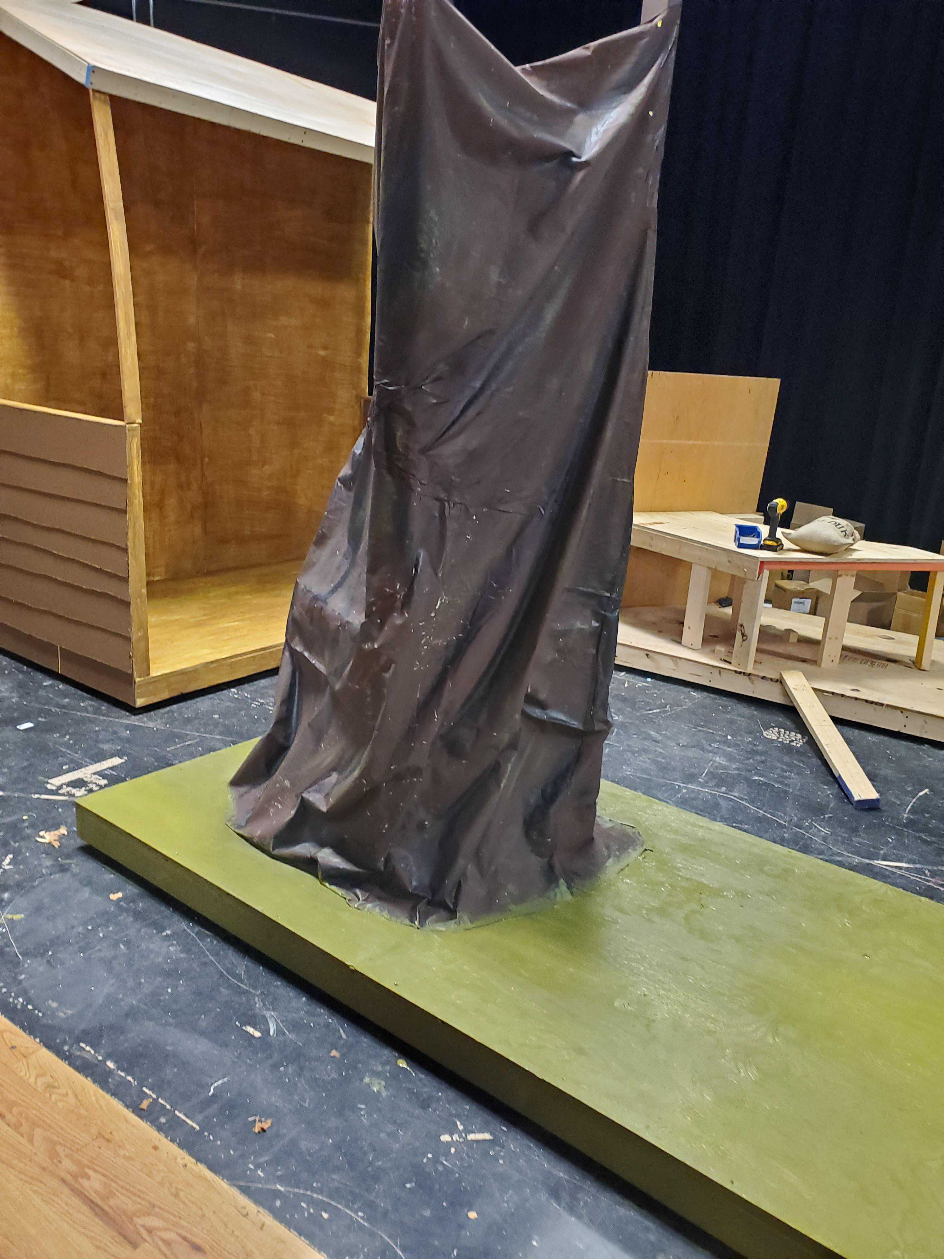 Bark texture painting on draped canvas tree trunk