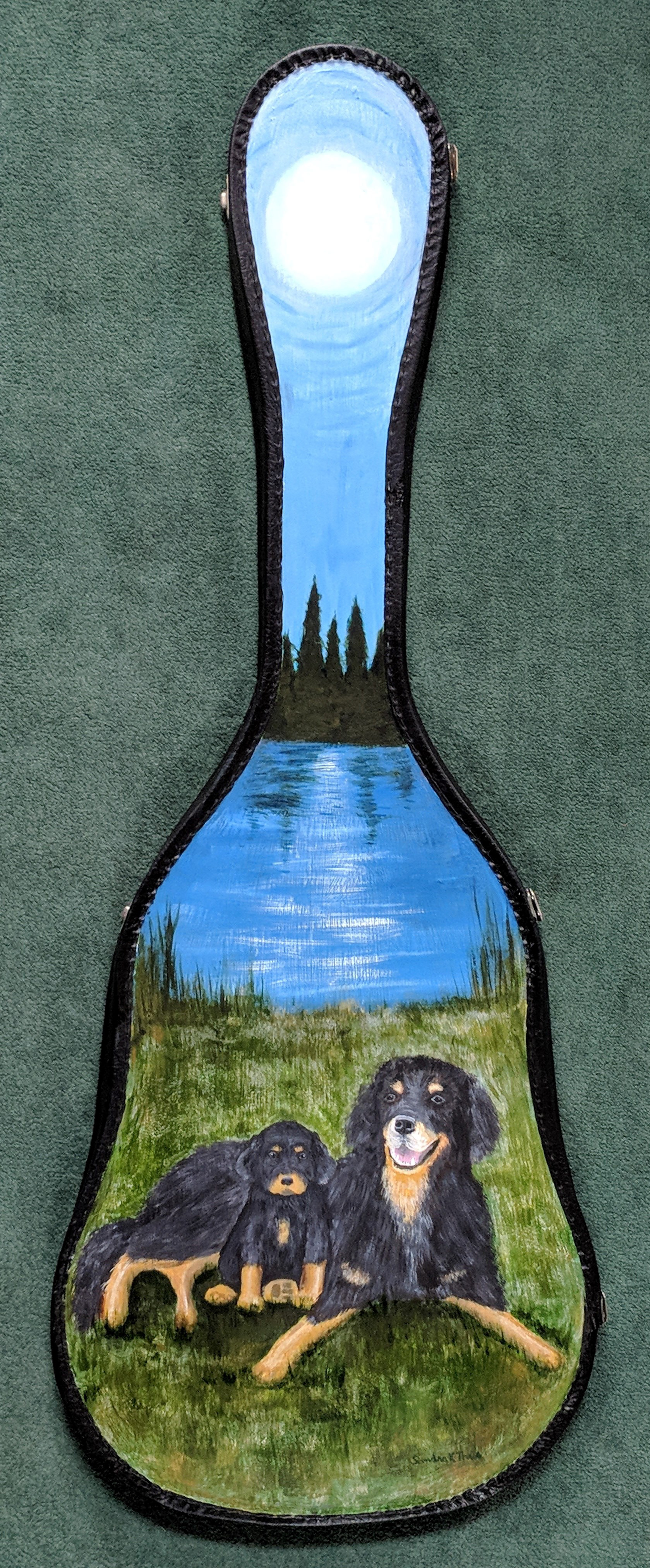 Dogs on guitar case cover