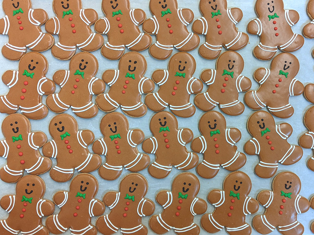 Renaud's Iced Cookies Gingerbread Men Production, Design by Novastarr Nelson