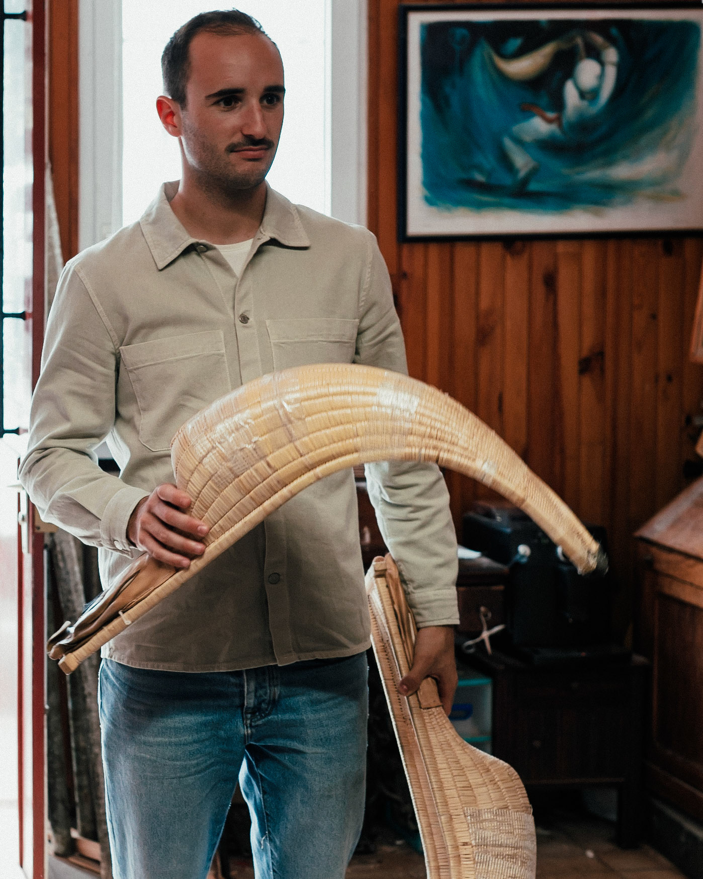 France, Bayonne, 2023-06-15. Basque pelota, a history of transmission in a sport with a long tradition. Discover the diversity of pelota with female players et with the French team's handi pelota section. Iban Etcheberry pelotari (Basque pelota player) from the Cesta Punta club in Saint Jean de Luz picks up his Chisteras from Peyo Gonzalez (the last French manufacturer of these gloves for Chesta Punta). Photograph by romain de sigalas / hans lucas. France, bayonne, 2023-06-15. La pelote Basque, une histoire de transmission dans un sport de longue tradition. A la rencontre de la diversite de la pelote avec les joueuses et egalement la section handi pelote de l equipe de France. Iban Etcheberry pelotari (joueur de pelote basque) de Cesta Punta au club de Saint Jean de Luz vient chercher ses Chisteras chez Peyo Gonzalez (dernier établissement français fabricant ces gants pour pratiquer la Chesta Punta). Photographie de romain de sigalas / hans lucas.