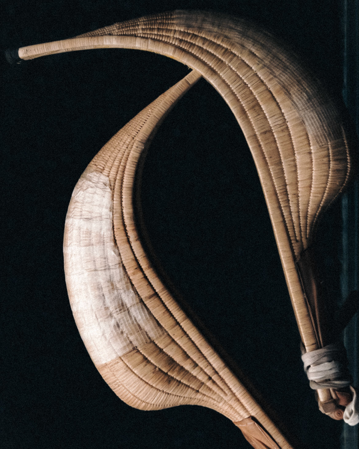 France, Bayonne, 2023-06-15. Basque pelota, a history of transmission in a sport with a long tradition. Discover the diversity of pelota with female players et with the French team's handi pelota section. The chistera is a combination of a leather glove and a wicker basket. It measures around 50 cm and is curved. The materials used are natural: leather for the glove, into which the player slips the 5 fingers separately, and wood for the basket. Different types of wood are used to make the basket: wicker, chestnut, ash and beech. Photograph by romain de sigalas / hans lucas. France, bayonne, 2023-06-15. La pelote Basque, une histoire de transmission dans un sport de longue tradition. A la rencontre de la diversite de la pelote avec les joueuses et egalement la section handi pelote de l equipe de France. Le chistera est l alliance d'un gant en cuir et d un panier en osier. Il mesure environ 50 cm et est recourbe. Les materiaux utilises sont des materiaux naturels : du cuir pour le gant, dans lequel le joueur enfile les 5 doigts séparément et du bois pour le panier. Différentes sortes d'essence sont nécessaires dans la fabrication du panier : de l osier, du chataignier, du frene et du hetre. Photographie de romain de sigalas / hans lucas.