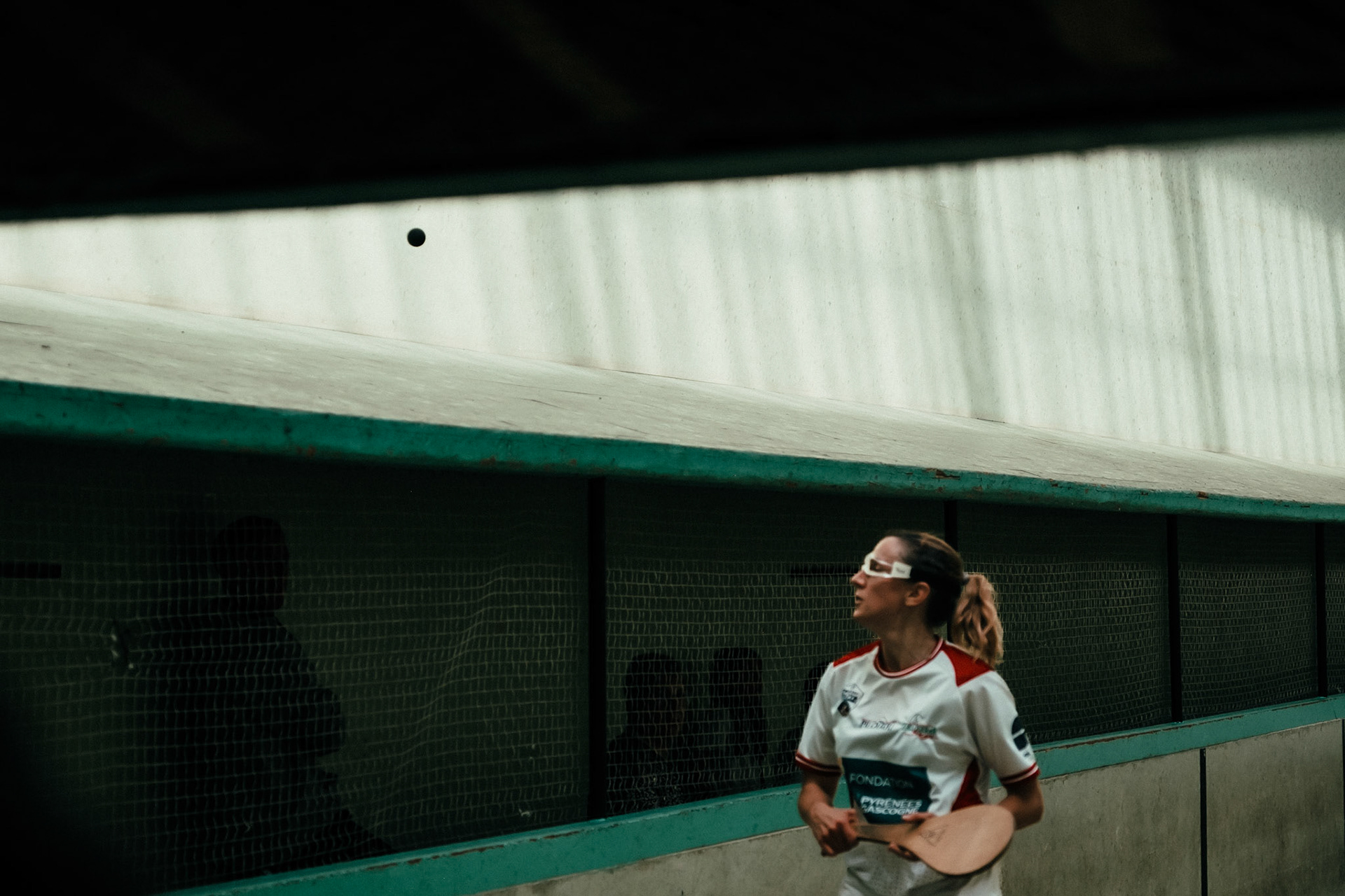 France, Bayonne, 2023-06-15. Basque pelota, a history of transmission in a sport with a long tradition. Discover the diversity of pelota with female players et with the French team's handi pelota section. During the semi-final of the French Paleta gomme pleine (pala) championships at the Saint Etienne de Baïgorry trinquet. Here Marielle Carrere is playing backcourt with Argia Olçomendi. Both started playing pala as children, thanks to the fronton in their village. Photograph by romain de sigalas / hans lucas. France, bayonne, 2023-06-15. La pelote Basque, une histoire de transmission dans un sport de longue tradition. A la rencontre de la diversite de la pelote avec les joueuses et egalement la section handi pelote de l equipe de France. Pendant la demi finale des championnats de France de Paleta gomme pleine (pala) au trinquet de Saint Etienne de Baigorry. Ici Marielle Carrere joue au poste d'arrière en duo avec Argia Olçomendi. Toutes les deux ont commence la pala a l enfance gace a la présence du fronton dans leur village. photographie de romain de sigalas / hans lucas.