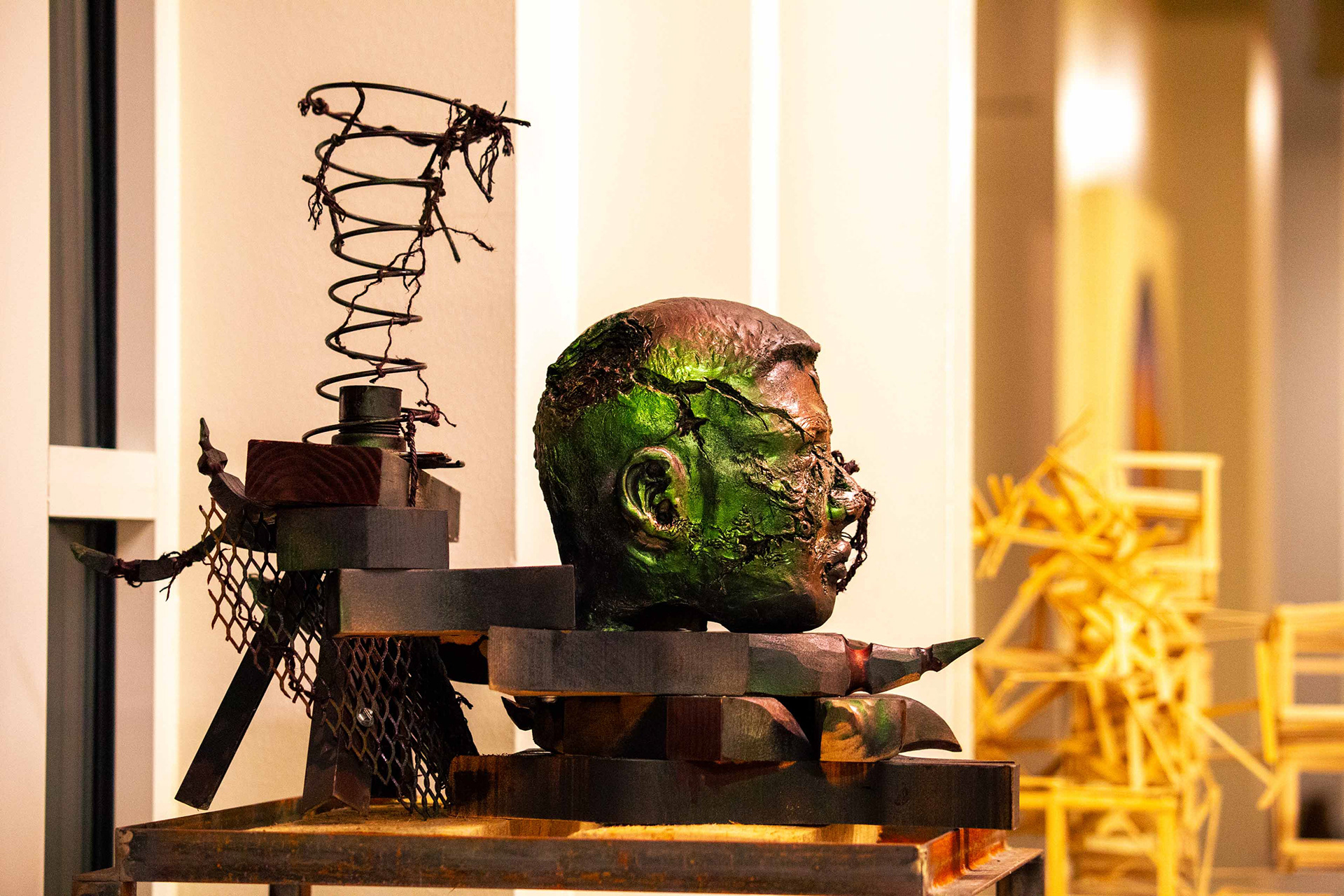 Side profile of sculpture "A Sacrifice" piece by Mtende Moyo.