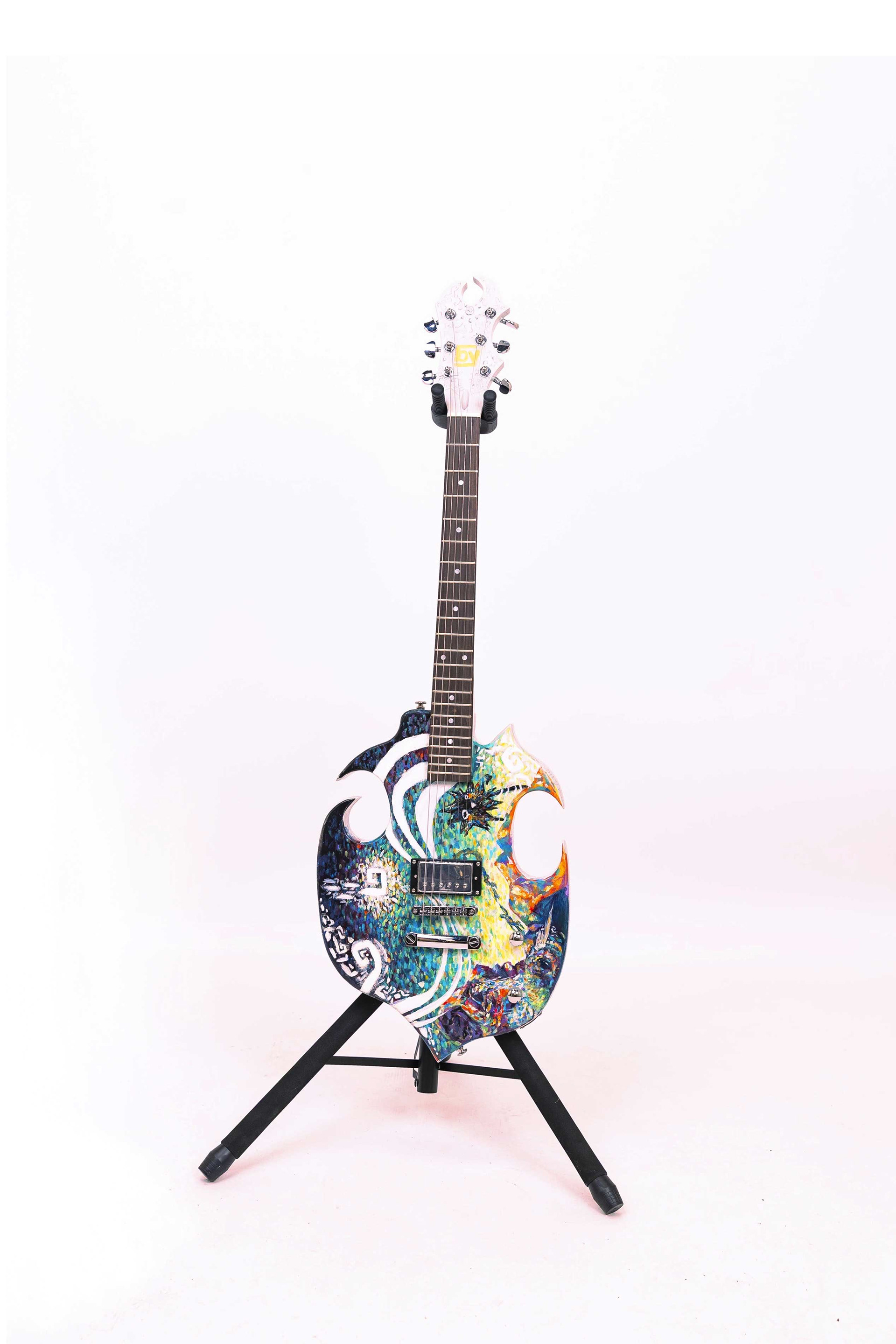 Image of a custom made guitar by Mtende Moyo titled The Day Dreamer.