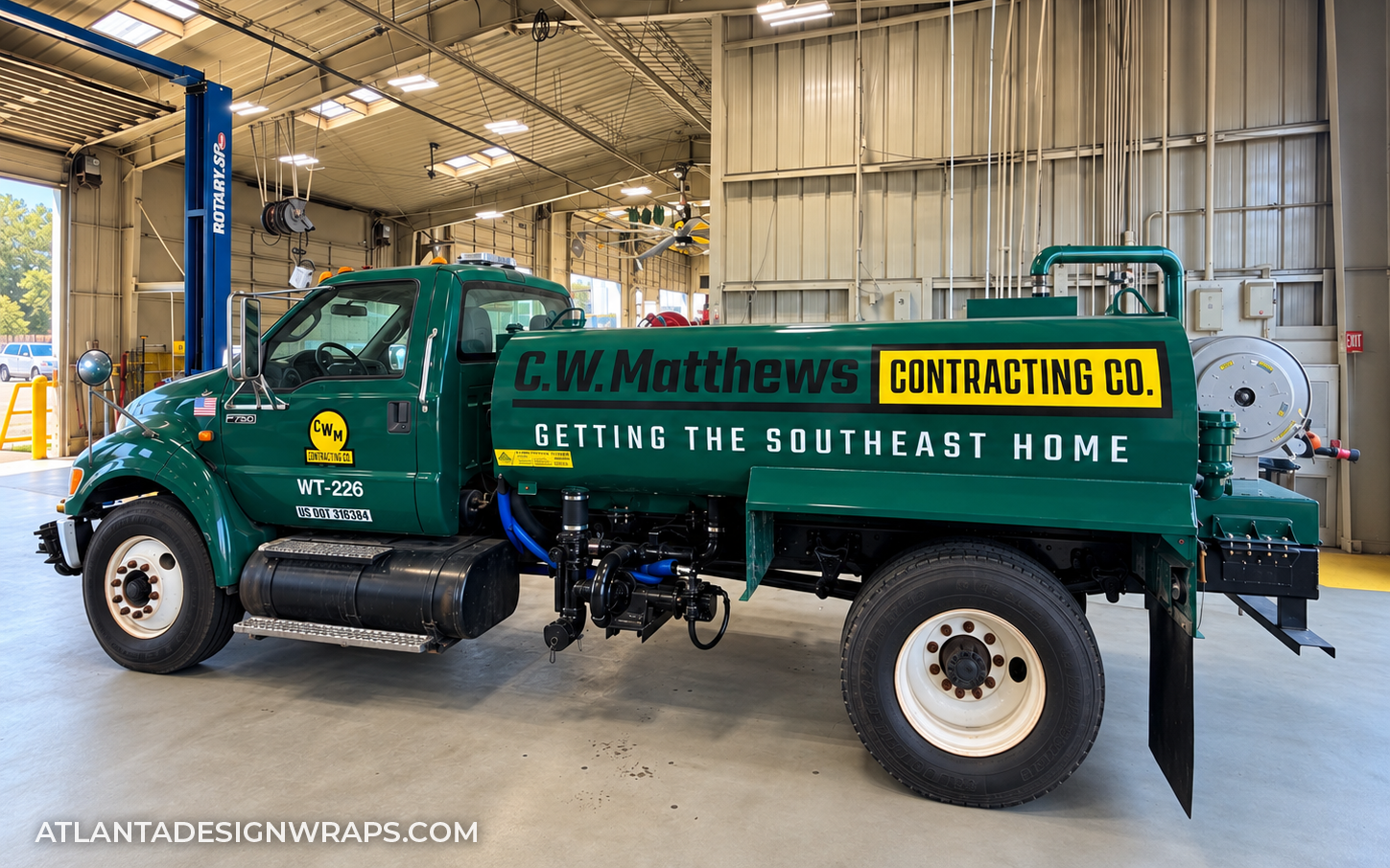 Construction vehicle graphics in Atlanta featuring custom fleet decals, equipment identification, DOT lettering and commercial truck branding.