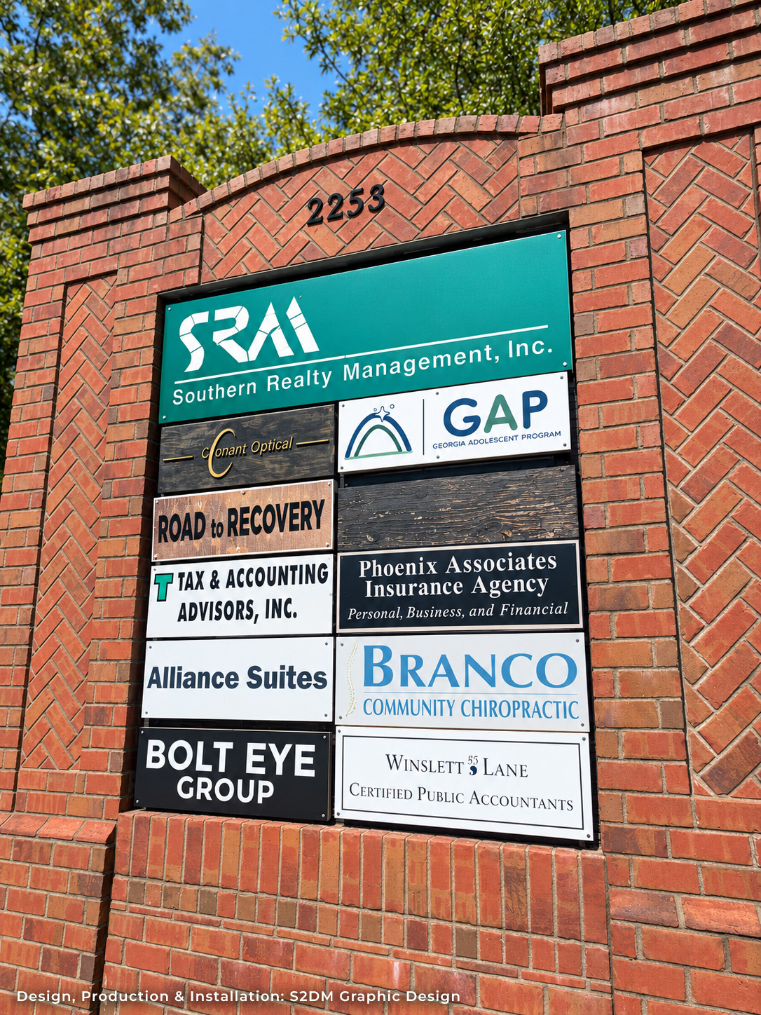 Custom aluminum tenant directory sign panel installed in an existing commercial monument sign in Metro Atlanta for Georgia Adolescent Program.