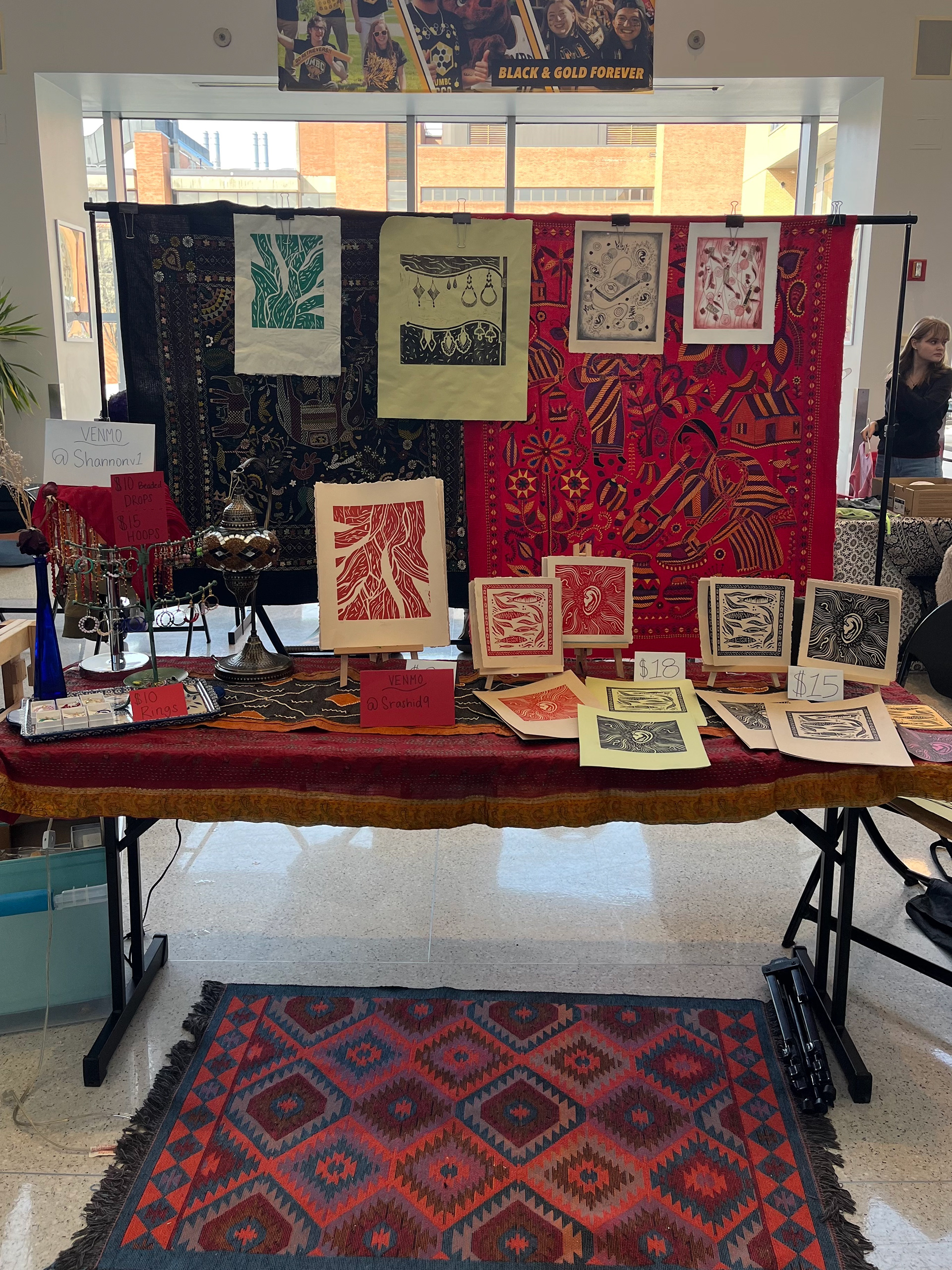 Rashid Prints Vendor Stand at a Flea Market