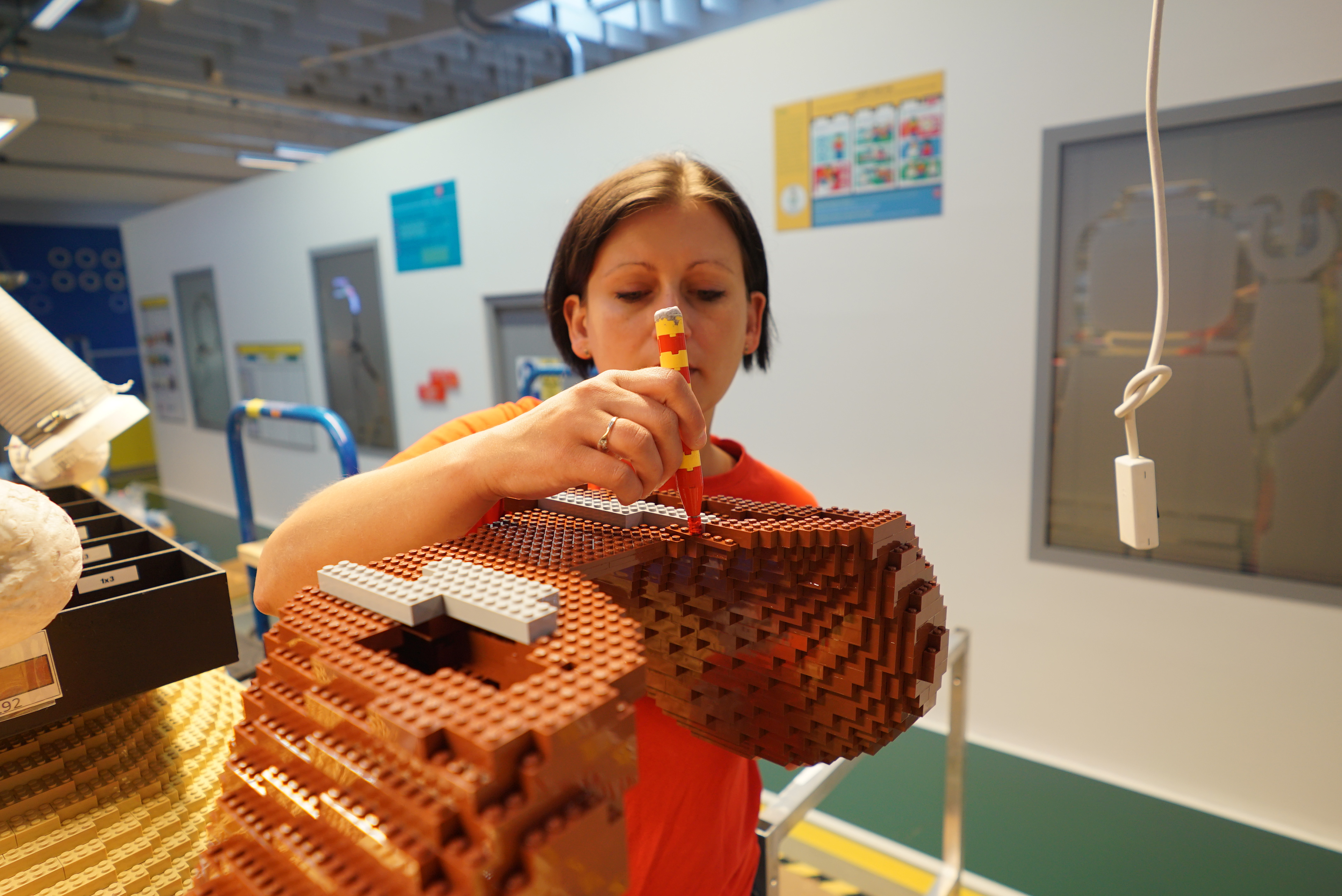 Each brick is carefully glued in place