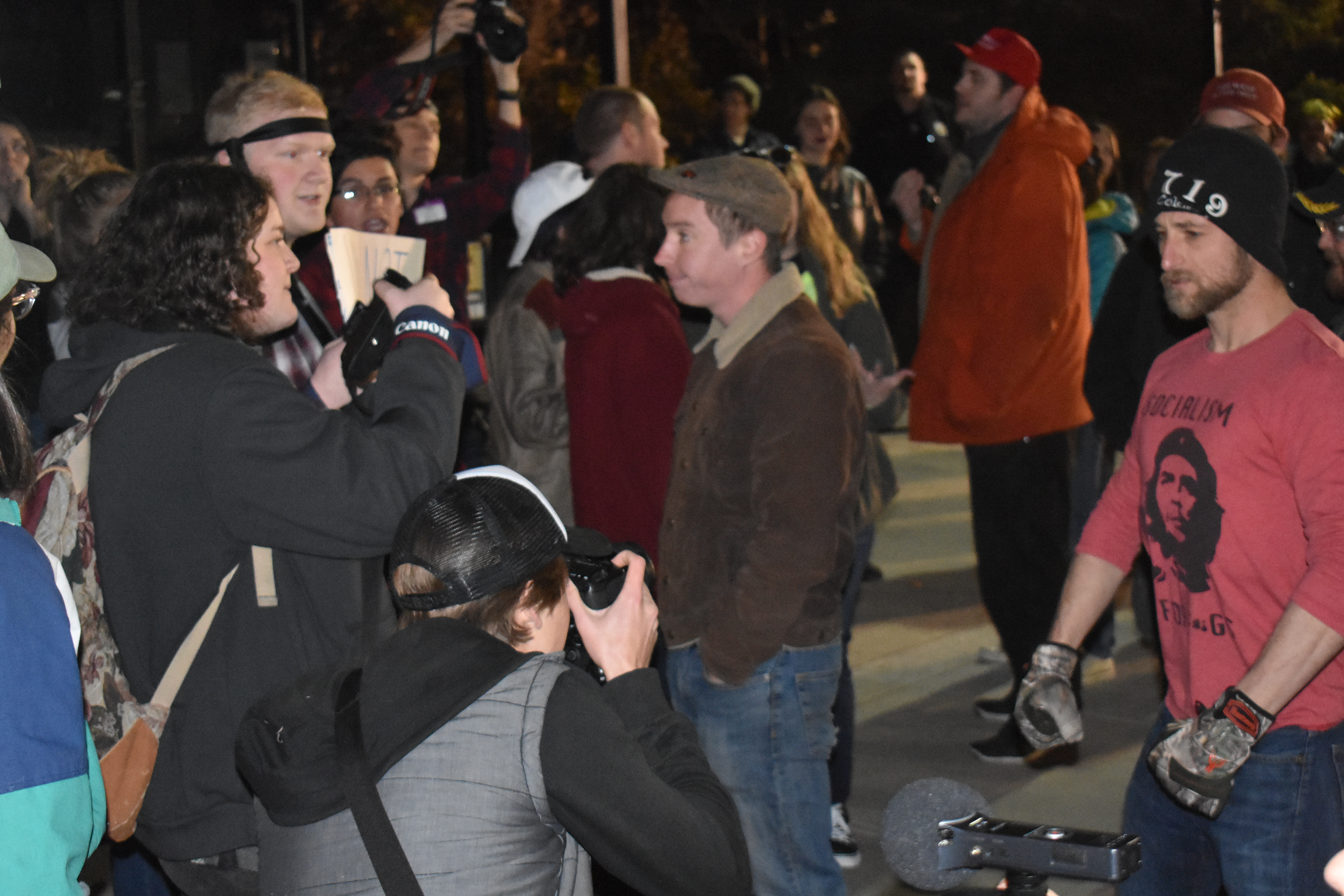 CU Independent photographer Hunter Allen photographs protesters on March 21, 2018