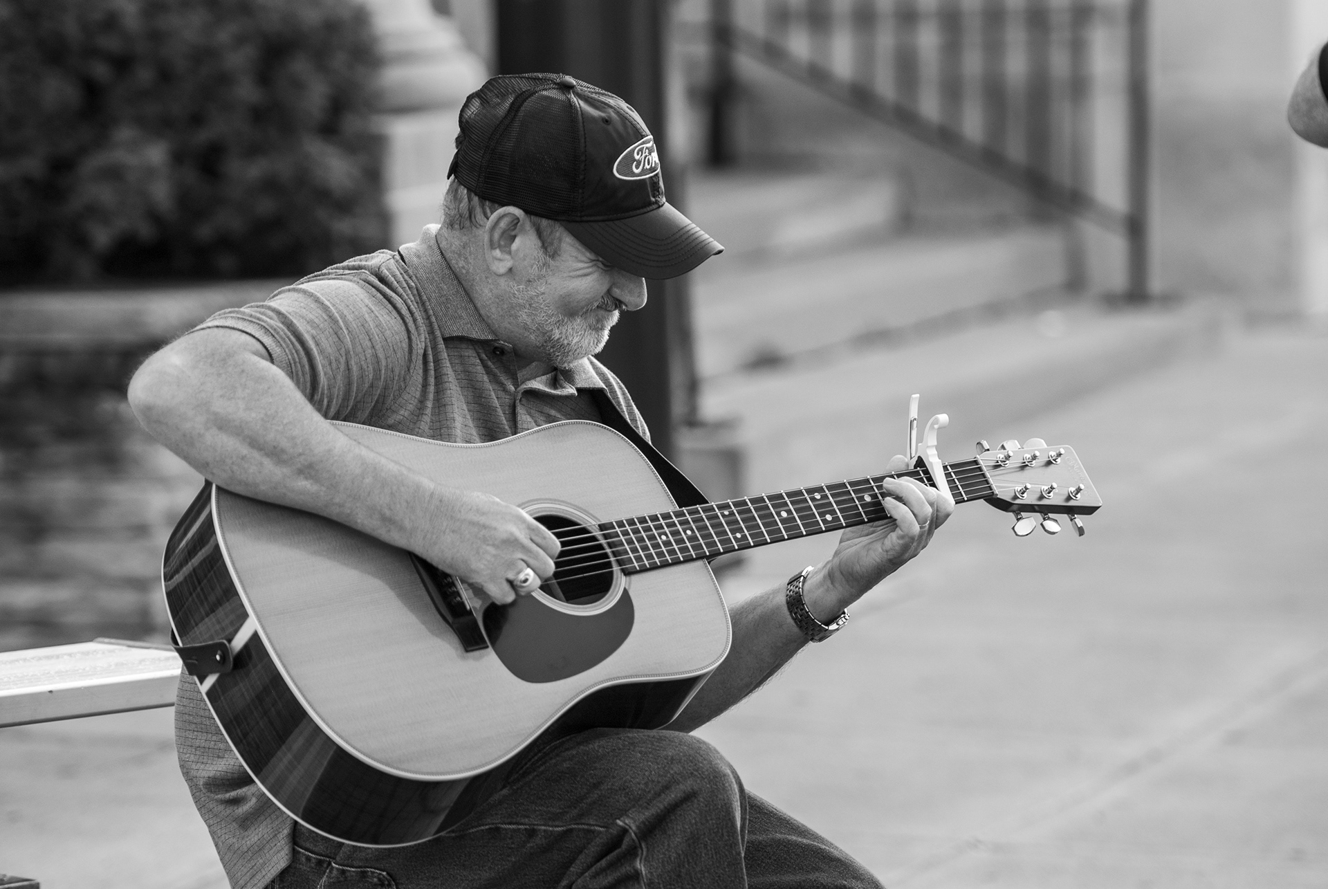 A guitarist practices before competition on the south stage at a music festival in Mount Vernon, Ohio.
