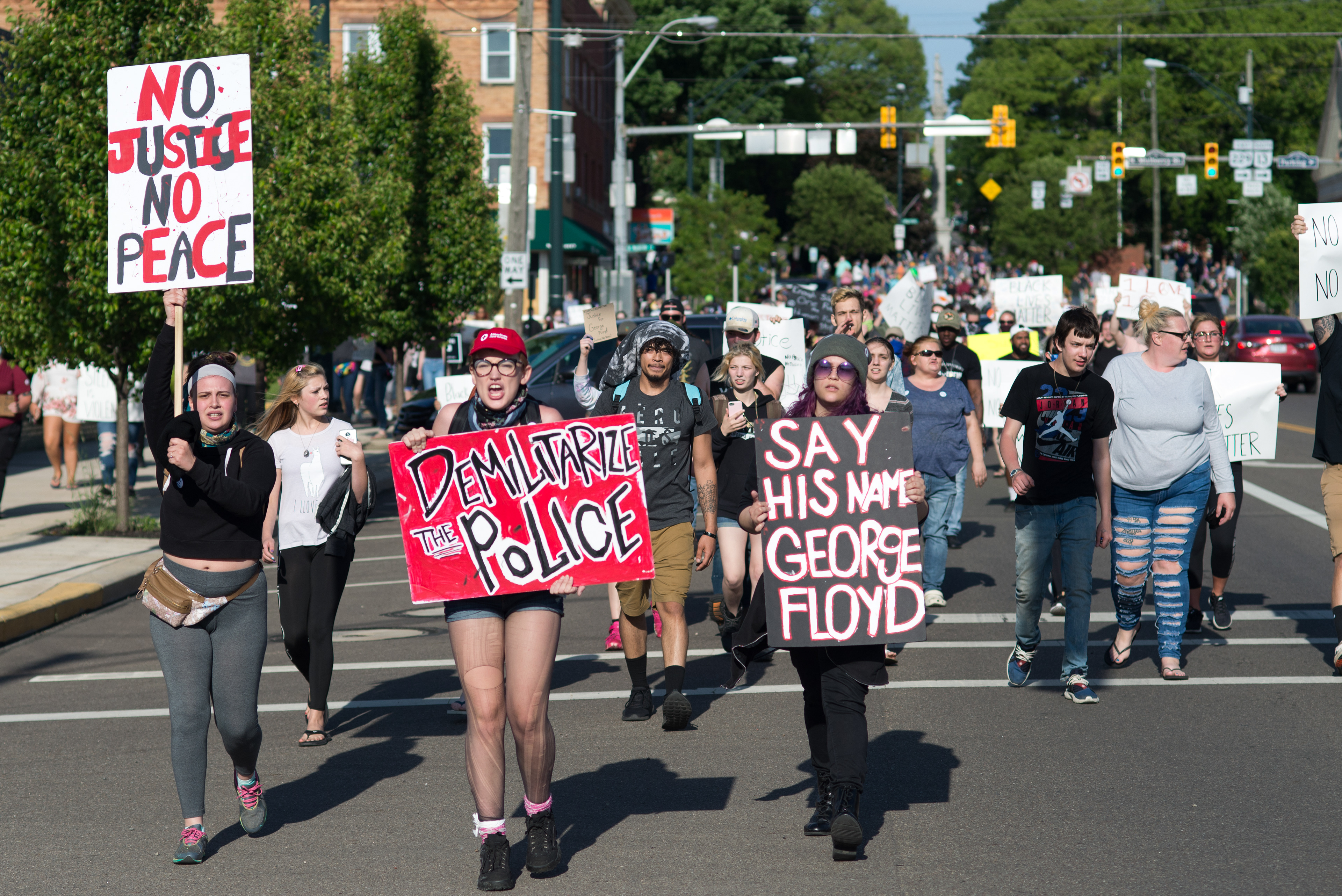 Protesters march through the streets of Mount Vernon, Ohio, on June 1, 2020. A group of college students organized the event to stand in solidarity with other protests across the nation spurred by the death of George Floyd in Minneapolis. Far from the industrial north’s urban centers, hundreds of protests have cropped up in small cities in rural areas.