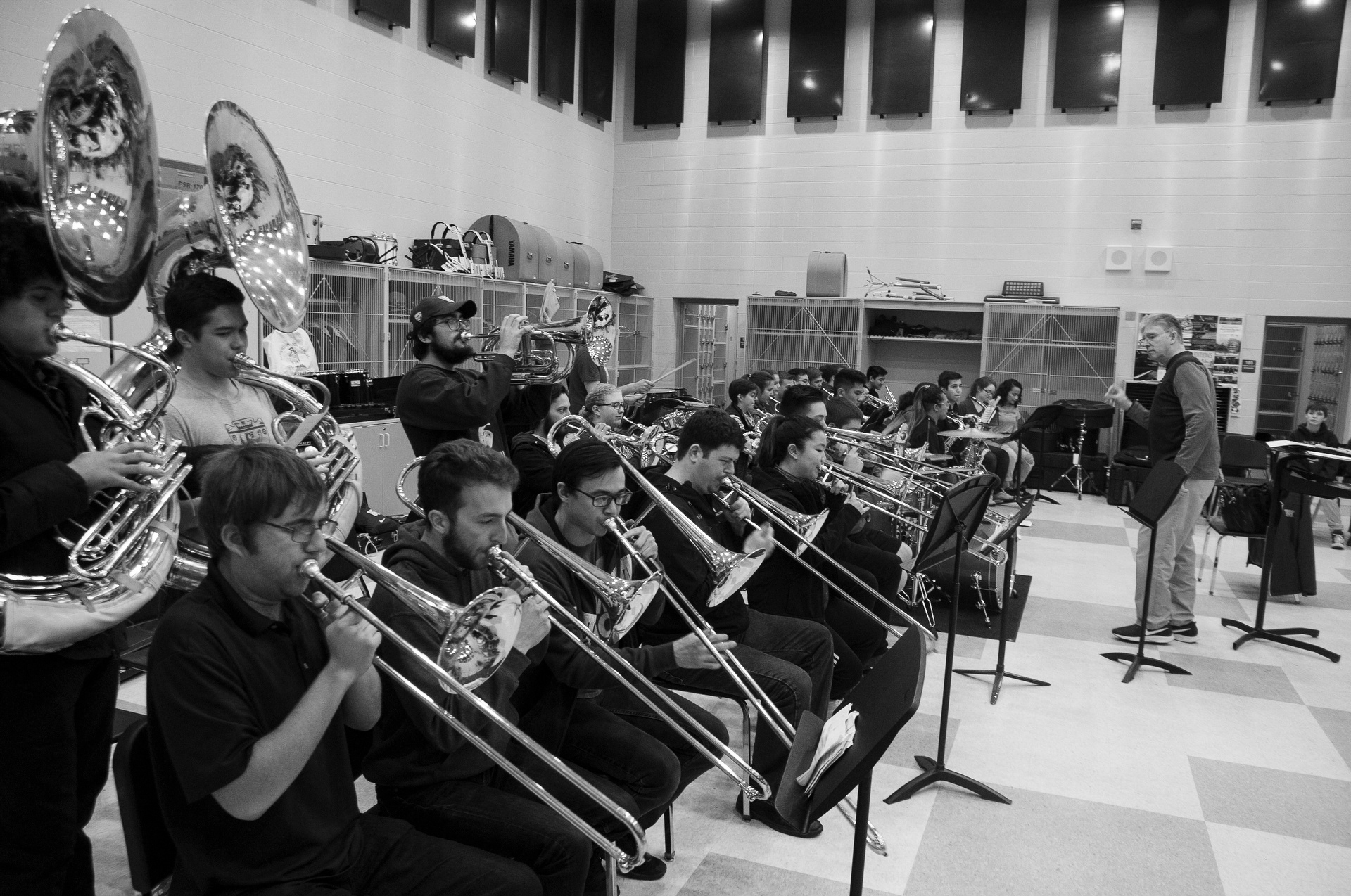 University of Washington band director and Centerburg graduate Dr. Brad McDavid (right) prepares the Huskies pep band for a 2019 NCAA basketball game in Columbus.