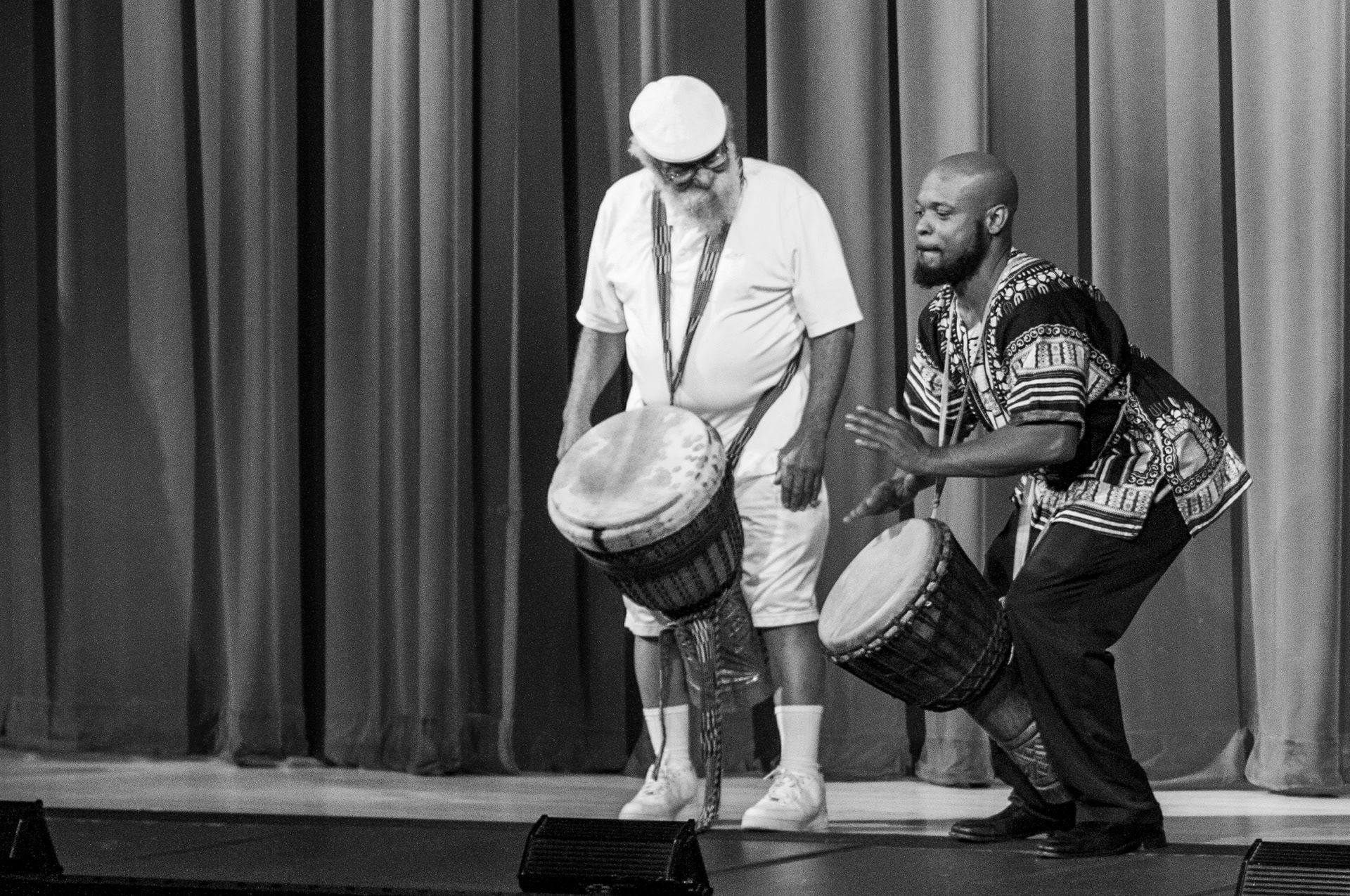 Tony West and drummers perform on the stage of the Memorial Theater in Mount Vernon, Ohio.