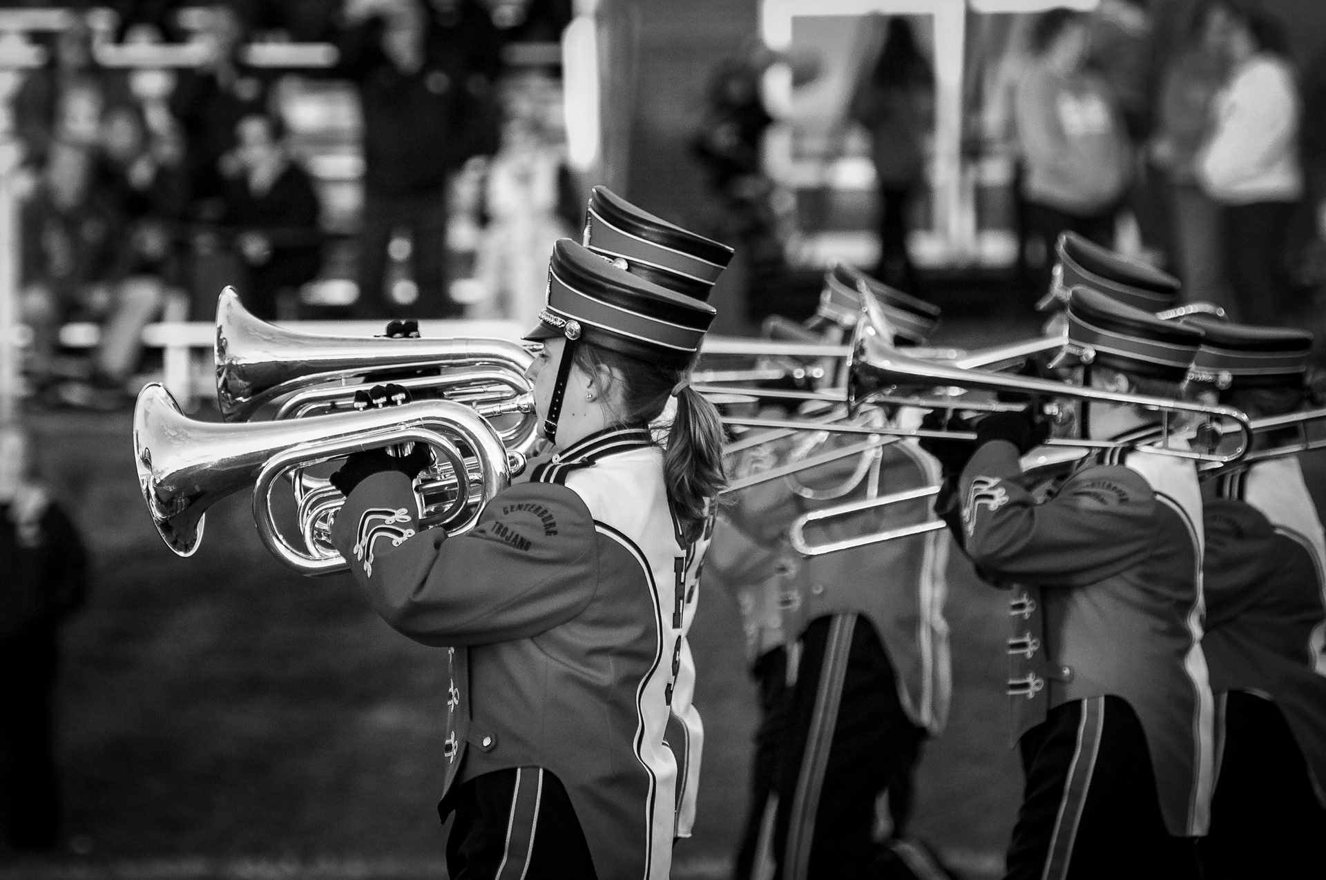 The Centerburg Marching Band takes to the field prior to the start of a high school football game. 
